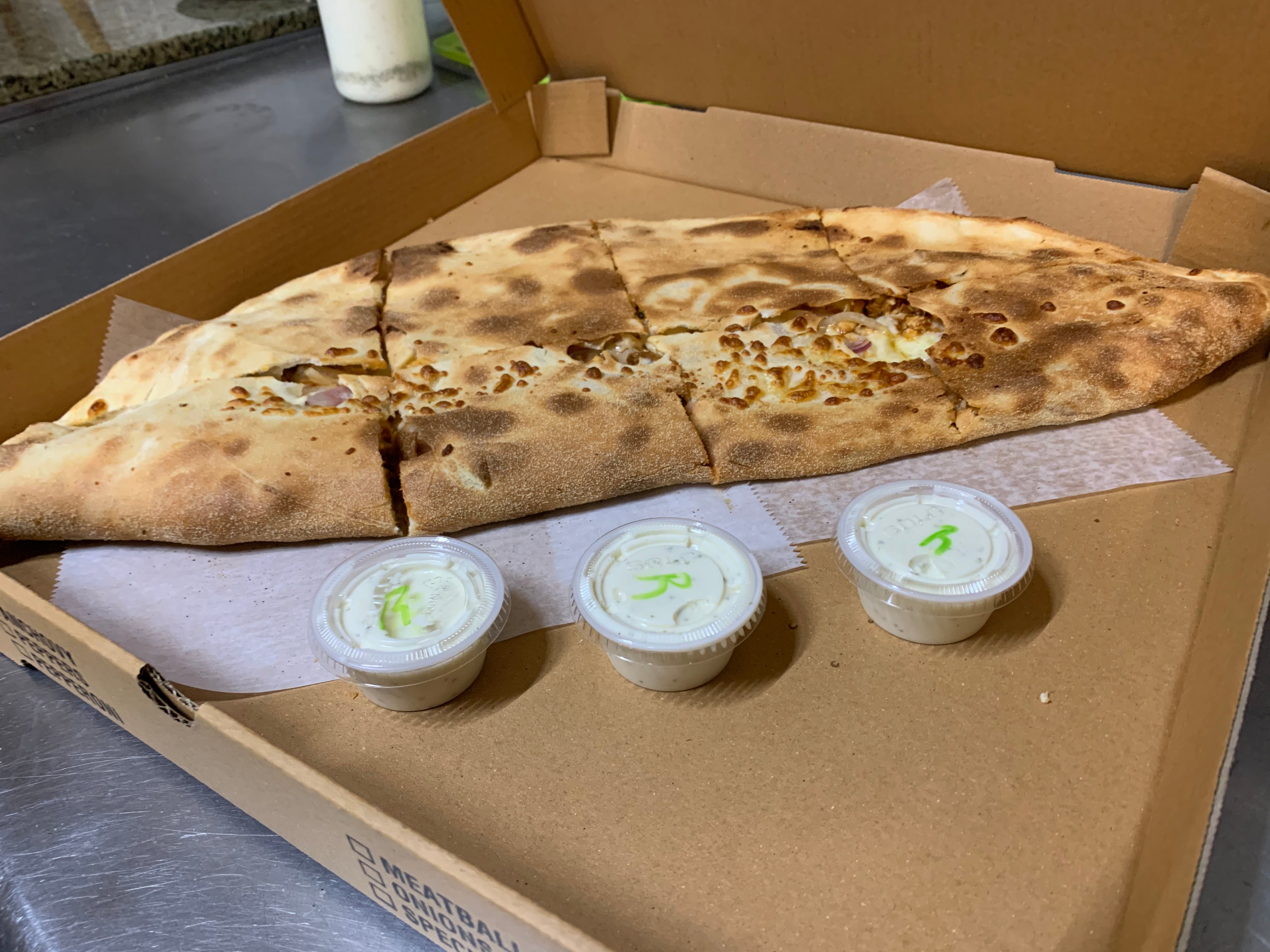 Order Rocco's Special Calzone - 14" medium feeds 2 food online from Pizza By Rocco store, Natick on bringmethat.com