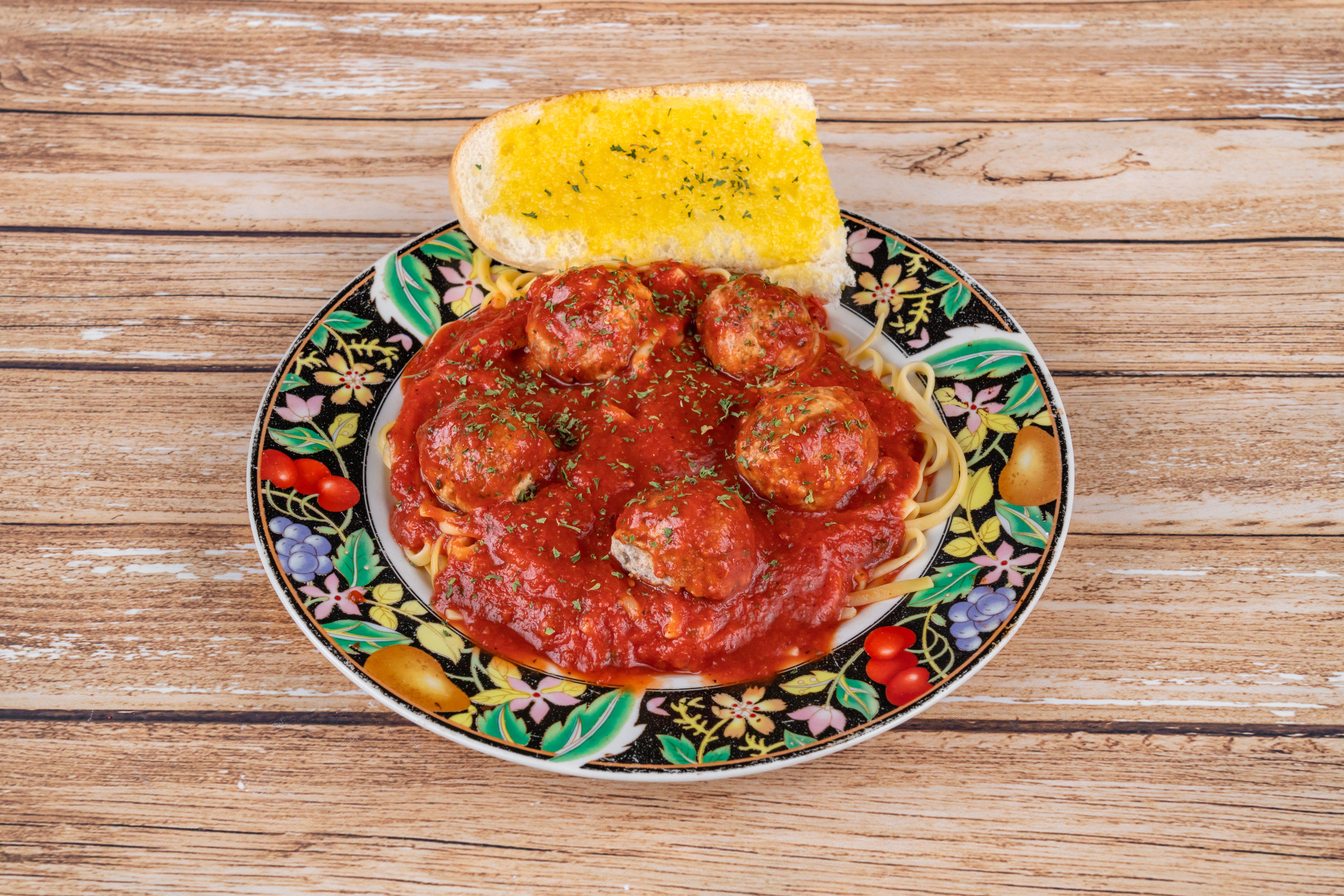 Order Spaghetti - Pasta food online from Angelo's Pizza store, Houston on bringmethat.com