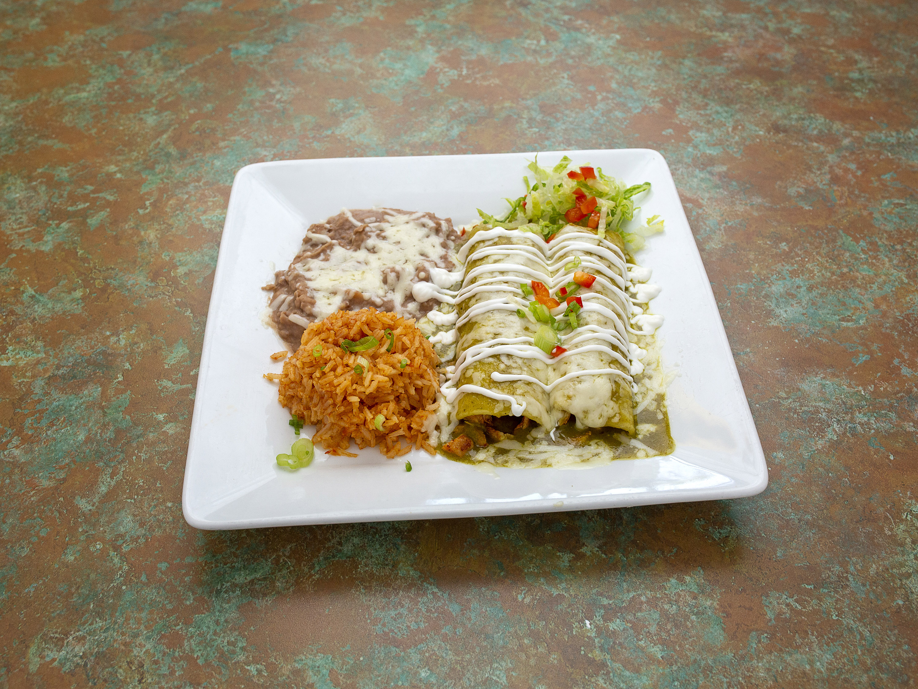 Order Enchiladas Suizas food online from Toto's Mexican Restaurant store, Boulder City on bringmethat.com