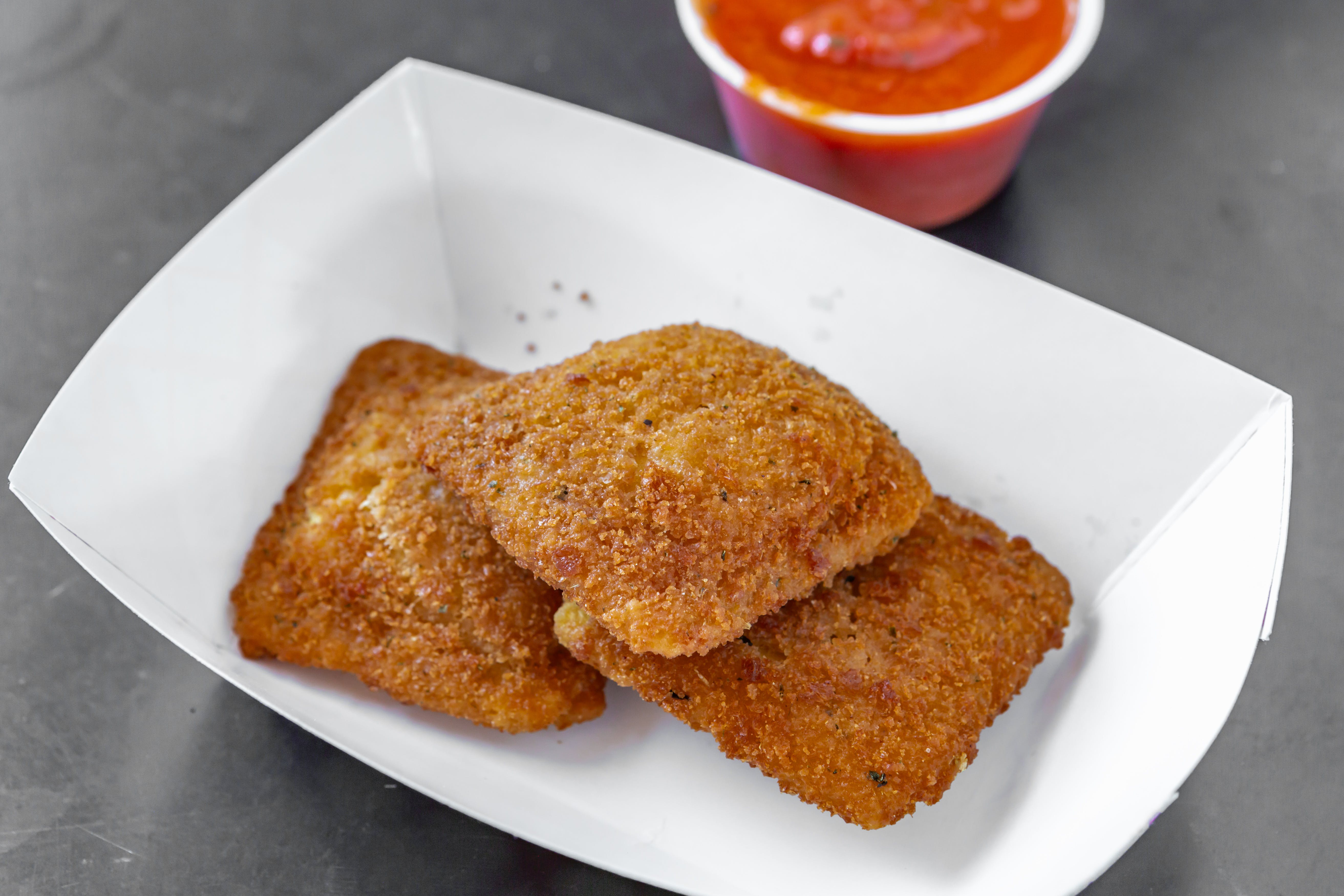 Order Fried Ravioli Bites - 7 pieces food online from Pizza By Rocco store, Natick on bringmethat.com