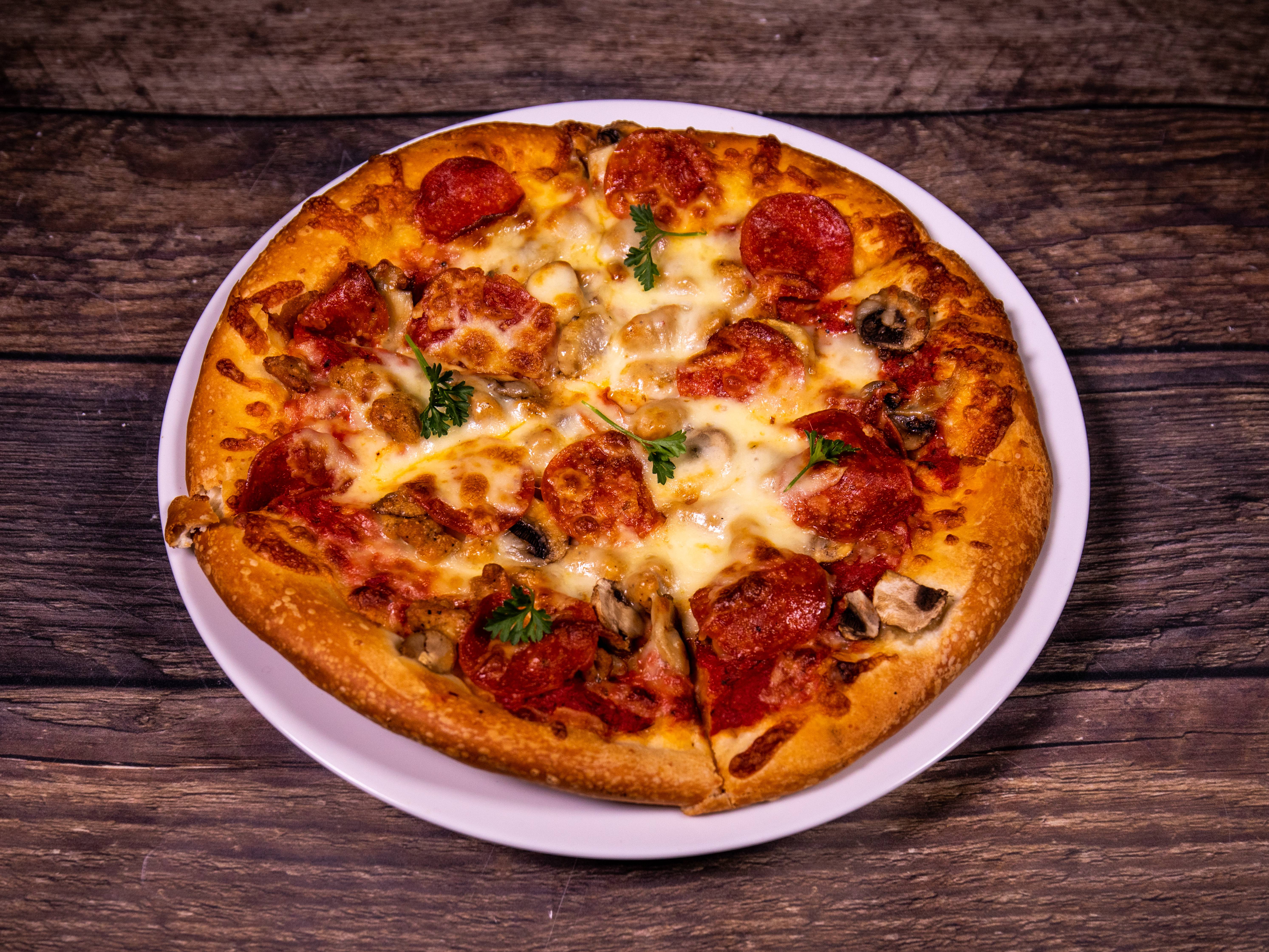 Order Famous Pizza food online from Flamin' Stone store, Spring on bringmethat.com