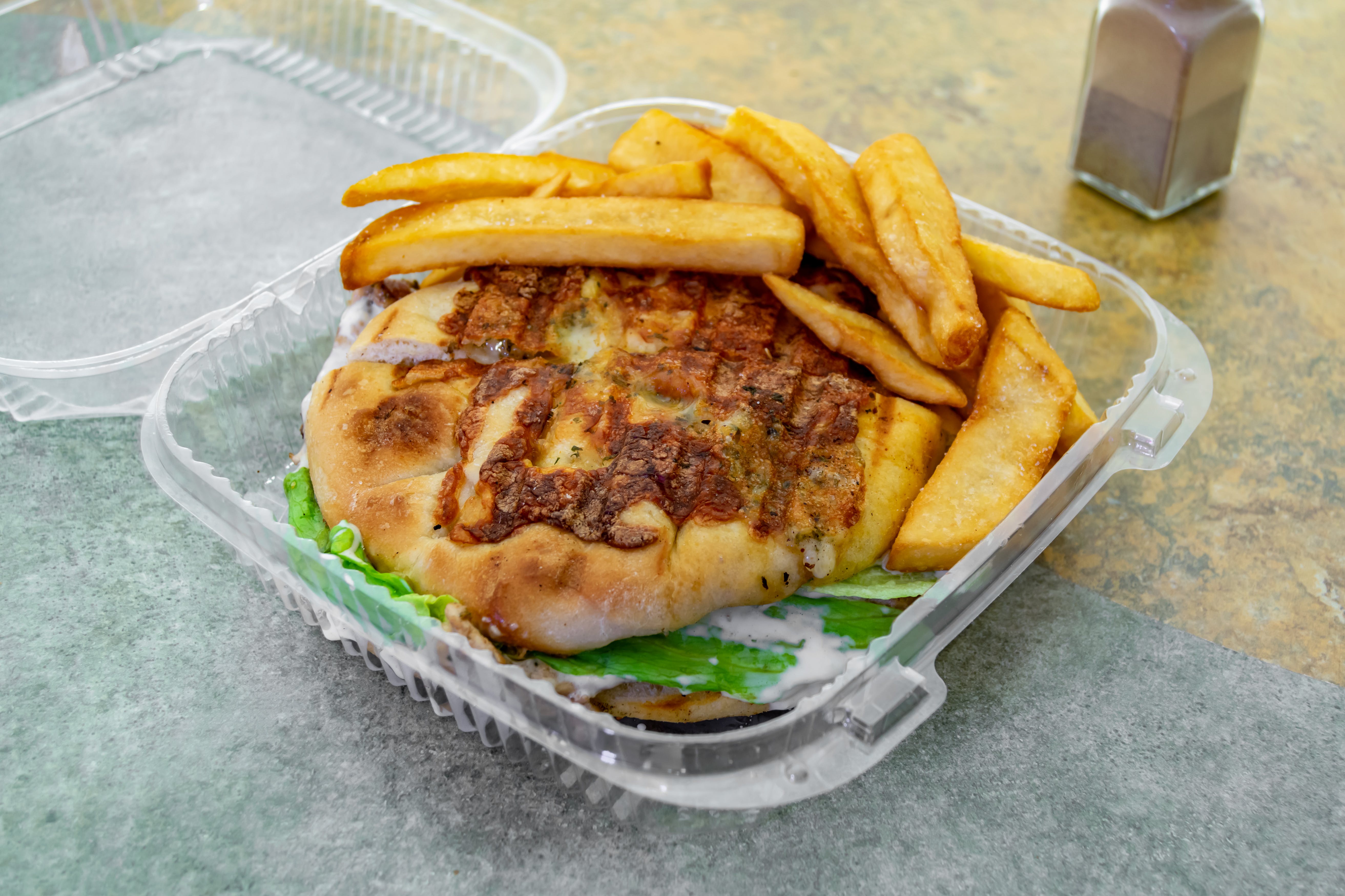 Order Chicken Caesar Panini - Panini food online from Two Tony's Pizza store, Linden on bringmethat.com