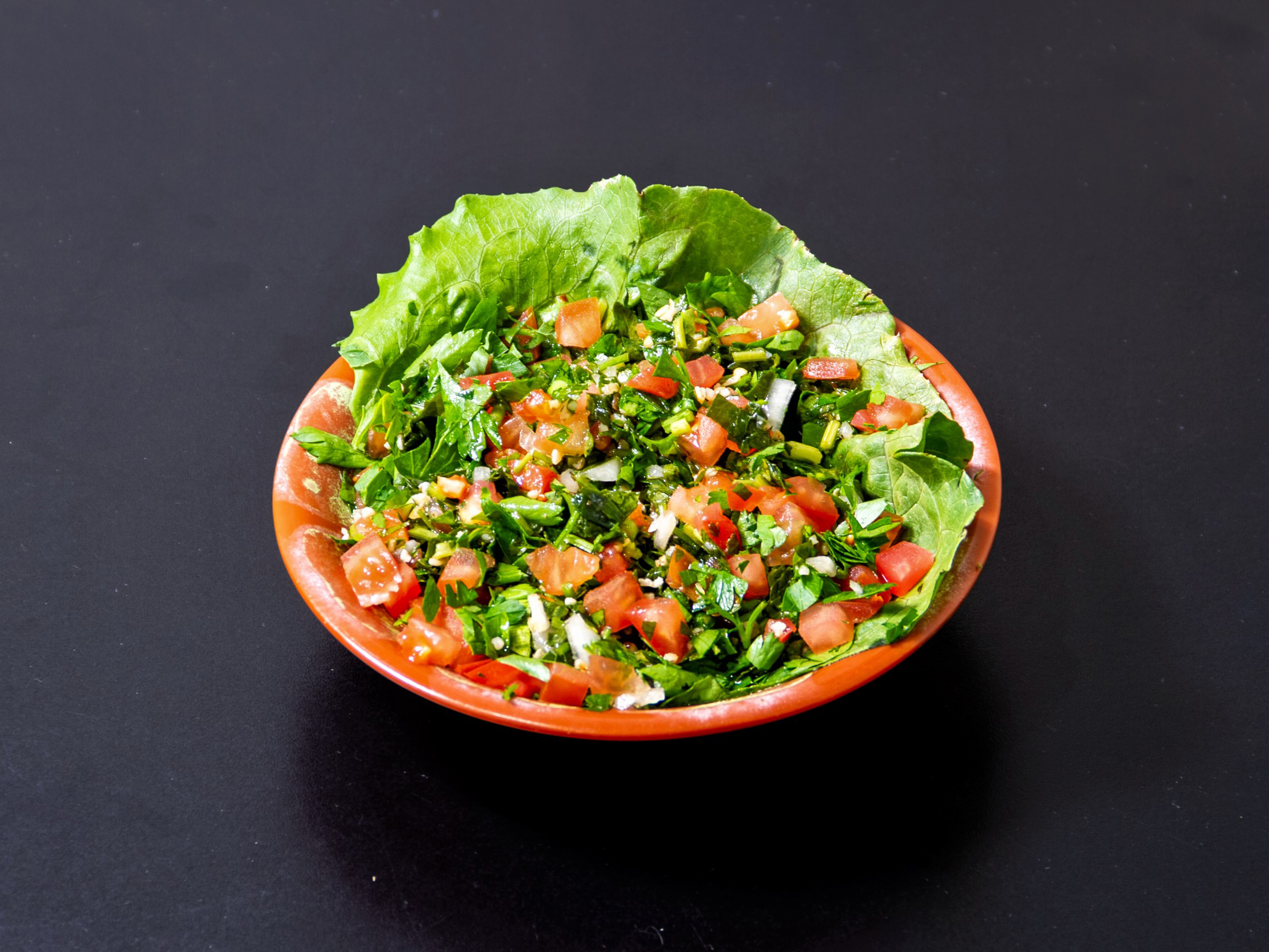 Order Tabbouleh Salad food online from Byblos Mediterranean Cafe store, Syracuse on bringmethat.com