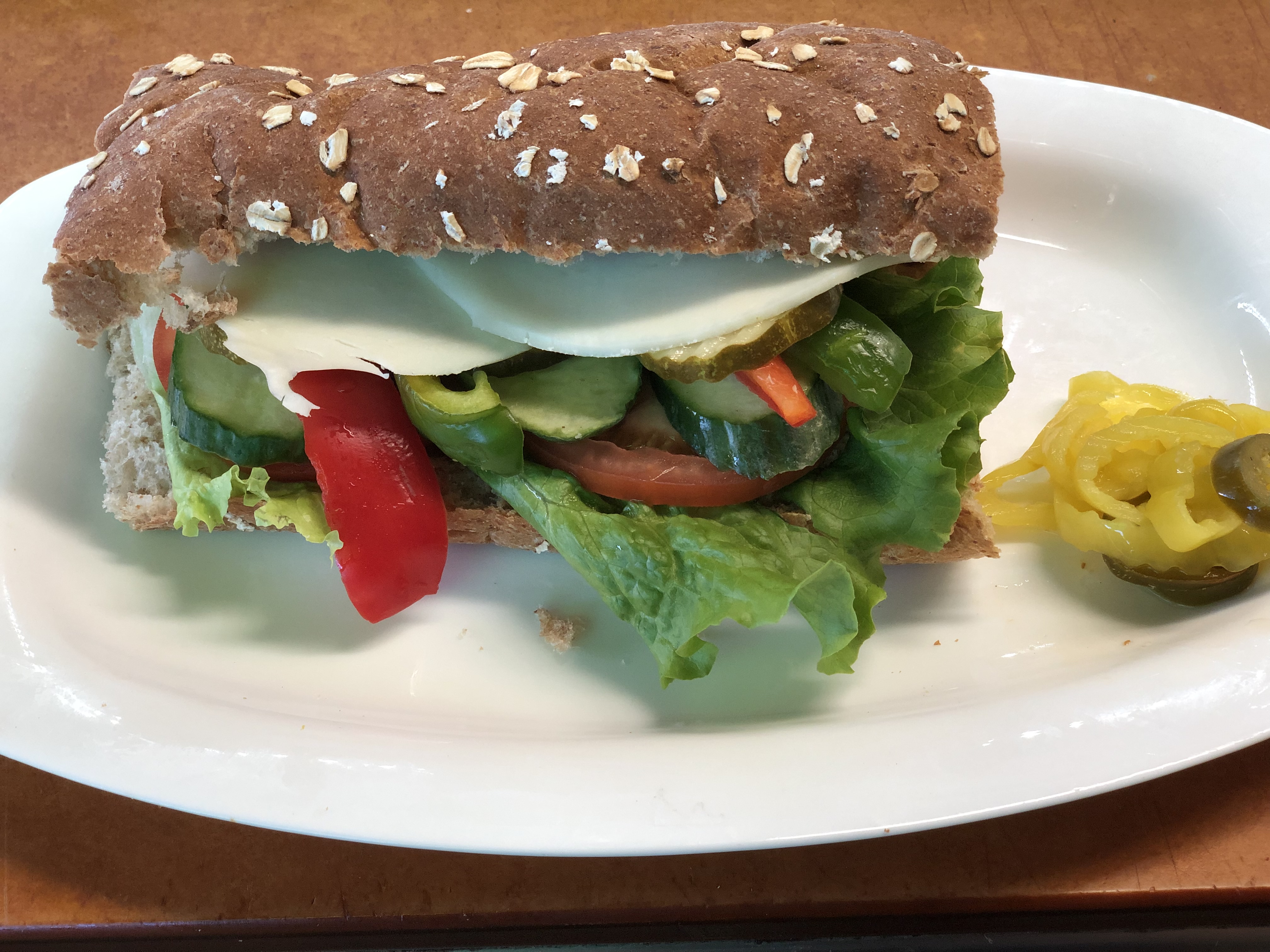 Order Veggie Sandwich with provolone cheese  food online from Lucca Food Deli store, San Francisco on bringmethat.com