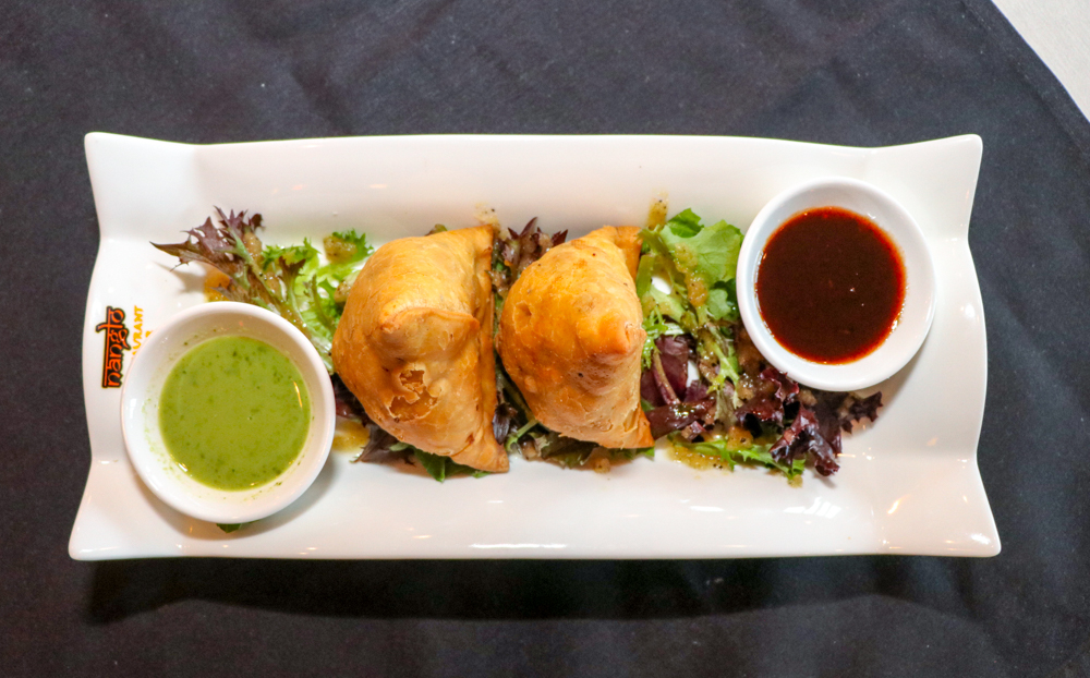Order 2 Pieces Vegetable Samosa (Vegan) food online from Nanglo Indian & Nepalese Restaurant store, Euless on bringmethat.com