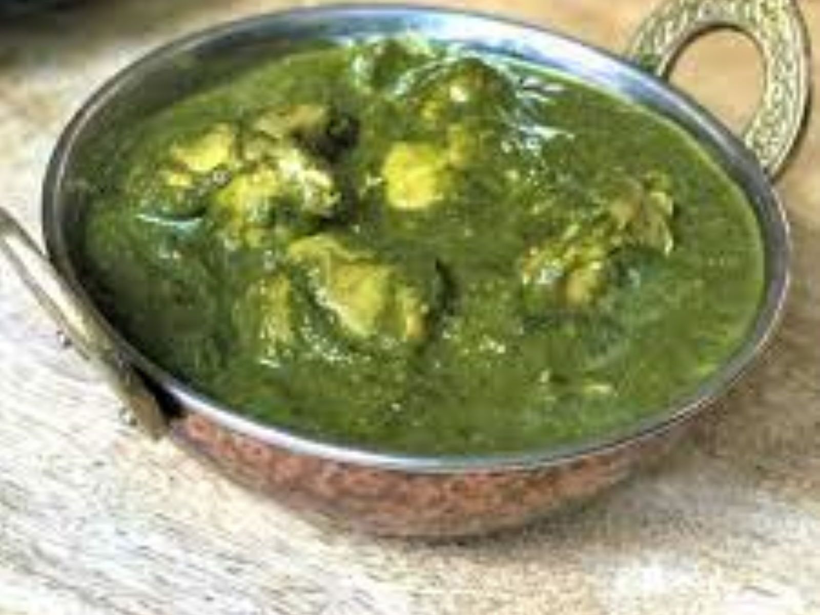 Order Chicken Tikka Saag food online from Passage to India store, Cambridge on bringmethat.com
