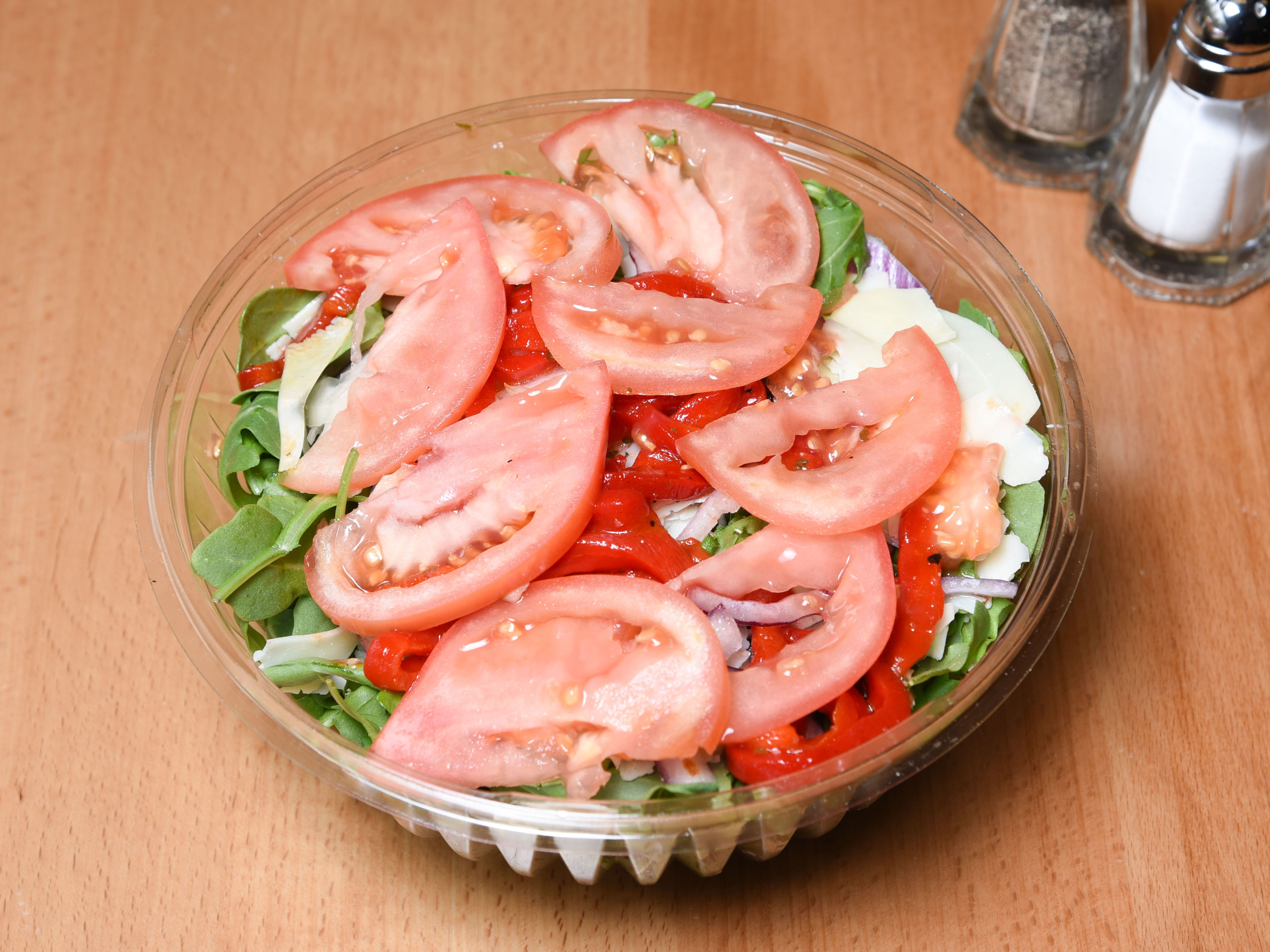 Order Arugula and Shaved Parmesan Salad food online from Tony's Pizzeria store, Irvington on bringmethat.com