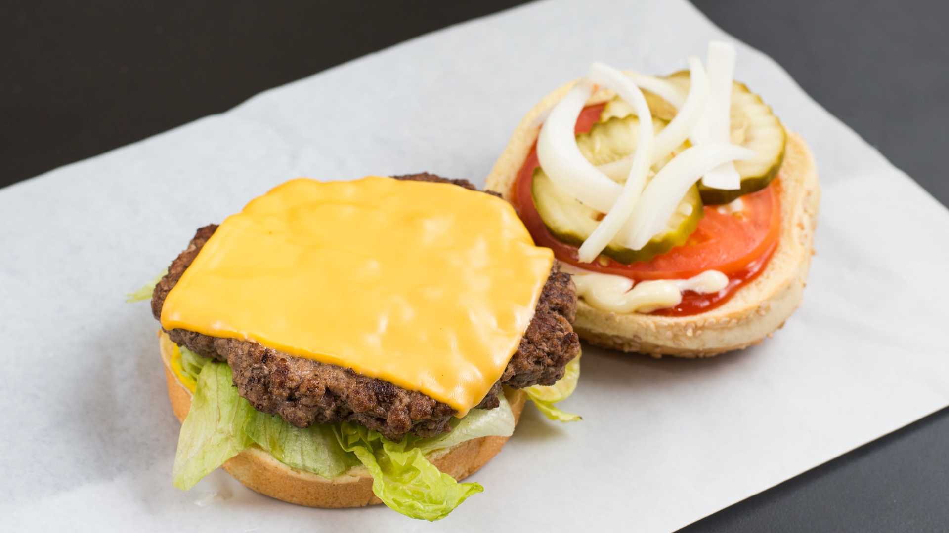 Order Cheeseburger  food online from Famous Cafe store, Carson on bringmethat.com