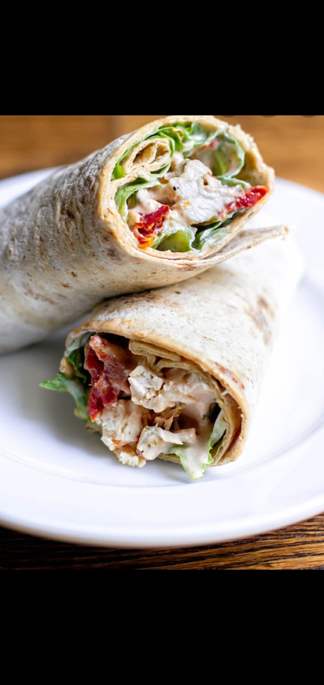 Order Classic Chicken Salad And  Bacon Wrap (chicken salad bacon lettuce tomatoes) food online from American Gourmet Foods Deli store, New York on bringmethat.com