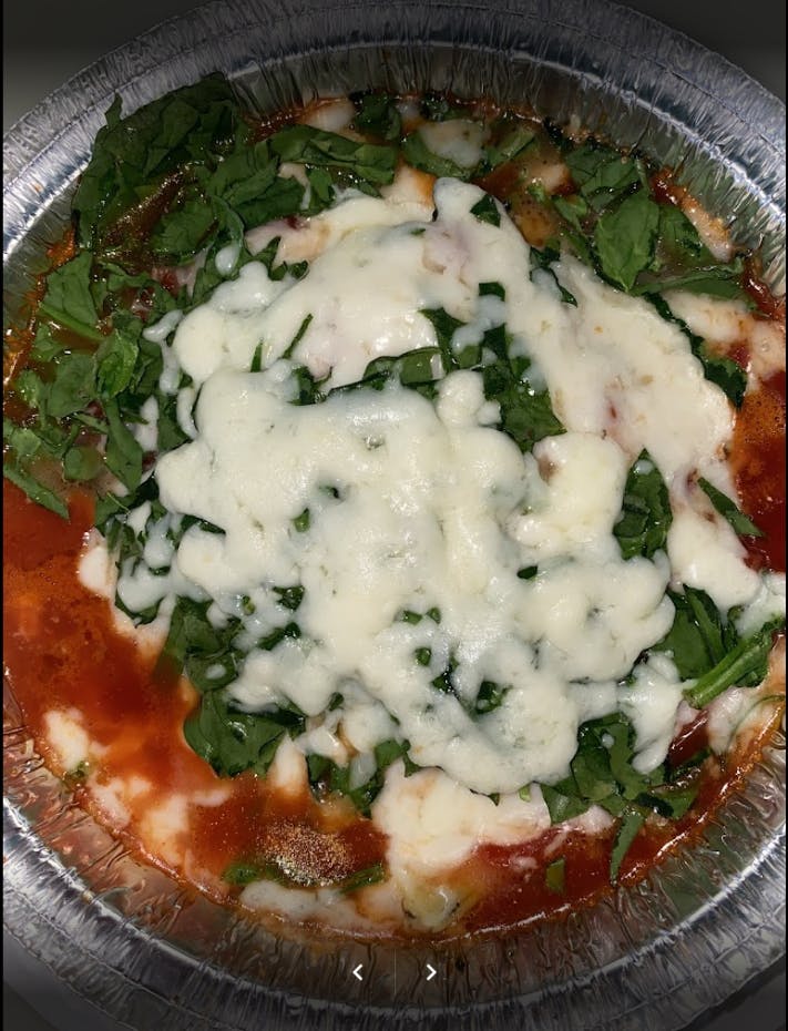 Order Spinach Lasagna - Pasta food online from Pizza Mania store, Norcross on bringmethat.com