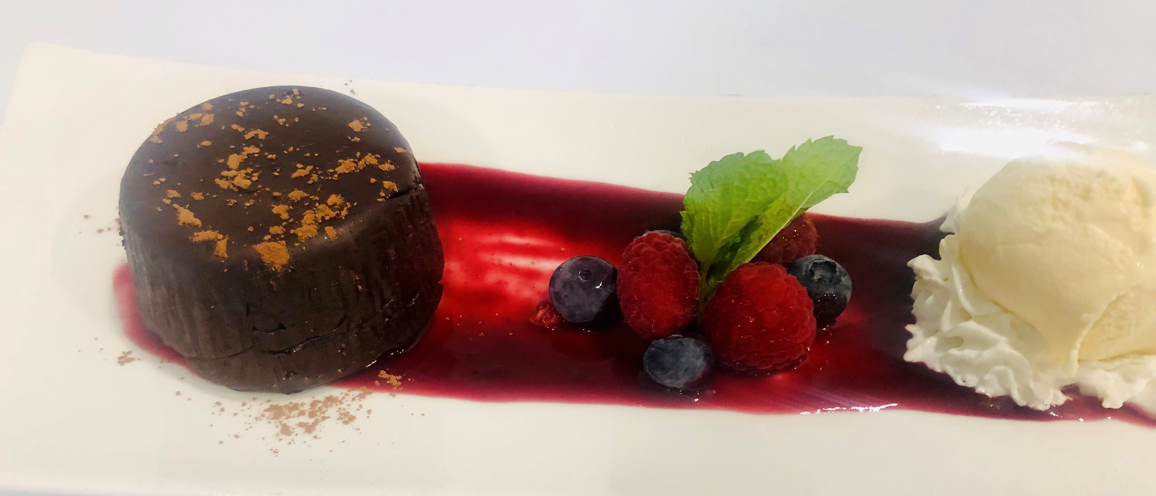Order  Flourless Chocolate Lava Cake food online from Valsos Table & Bar store, Revere on bringmethat.com