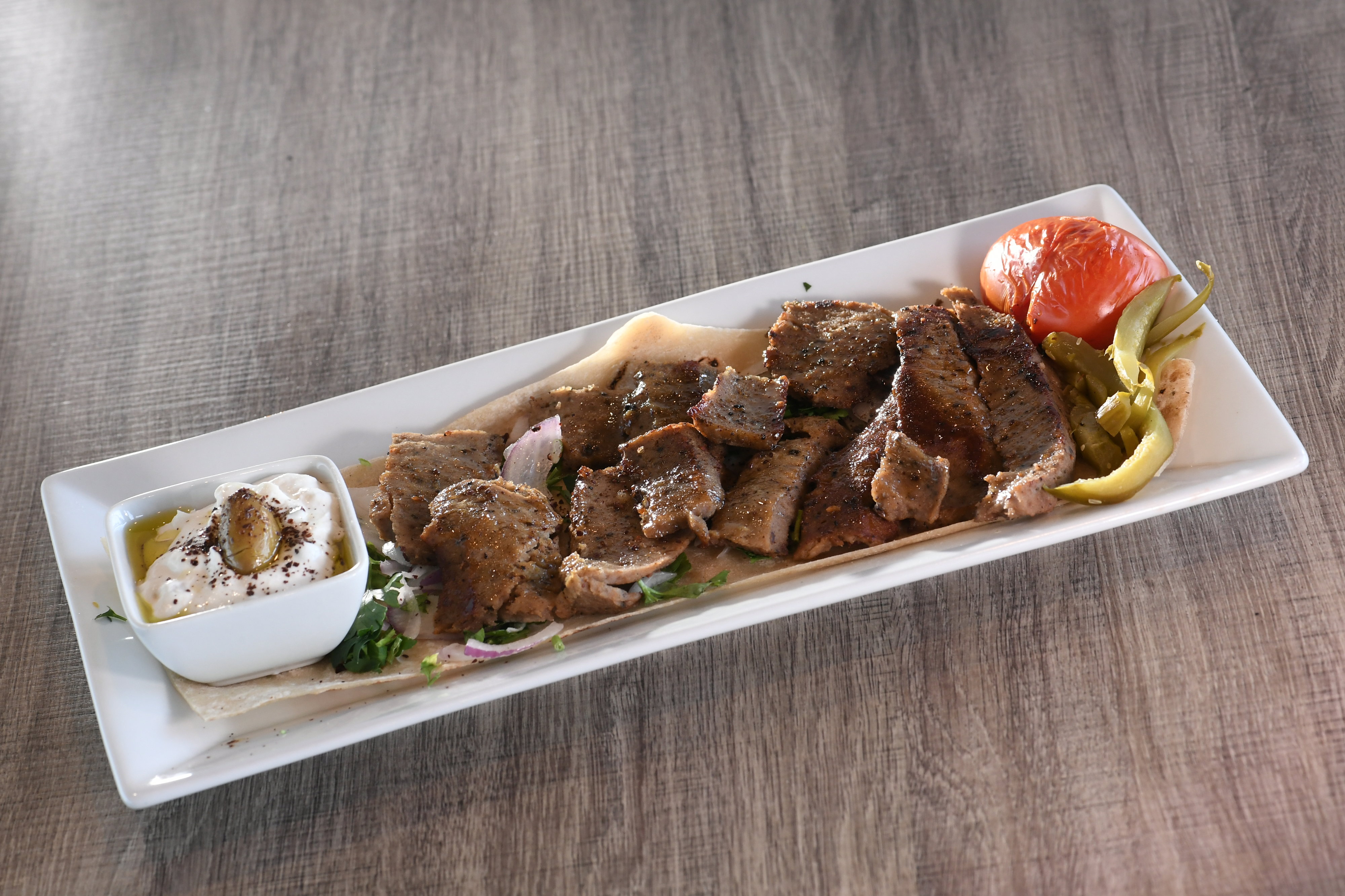 Order Gyro Plate food online from Kababchi Grill store, San Antonio on bringmethat.com
