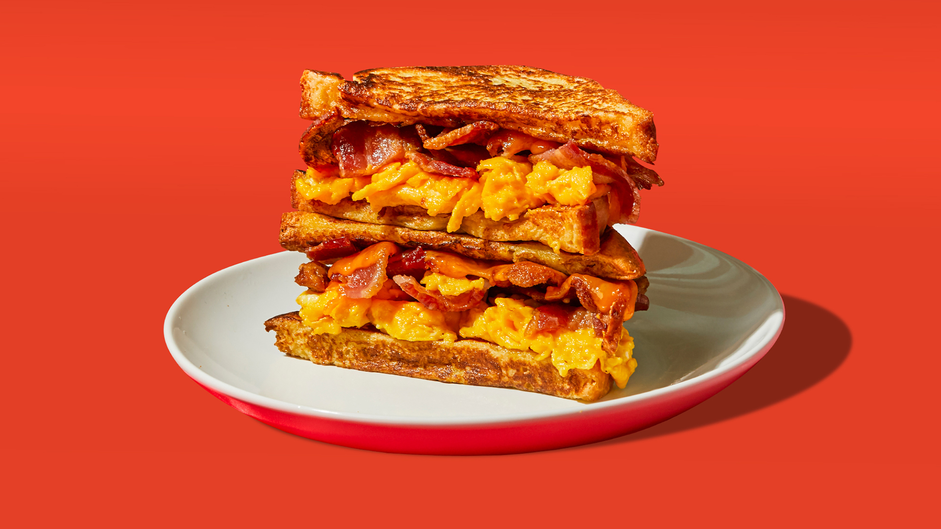 Order Bacon Egg & Cheese French Toast Sandwich food online from French Toast Feast store, New York on bringmethat.com