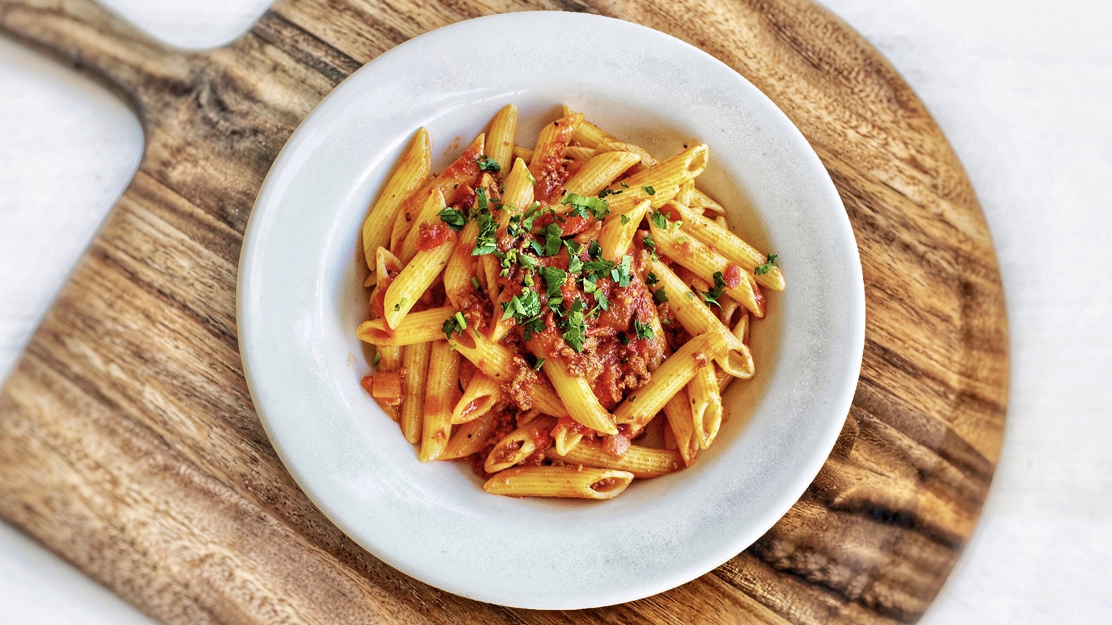 Order PENNE WITH MEAT SAUCE  food online from Freddie Parker's Pasta Shop store, Vacaville on bringmethat.com