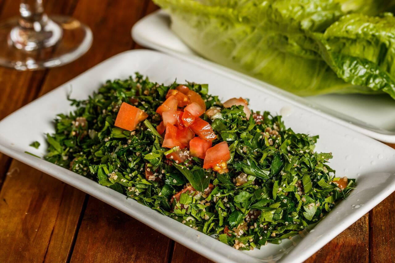 Order Tabbouleh Salad food online from Mezza Grille store, Houston on bringmethat.com