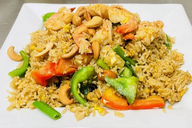 Order Pineapple Fried Rice food online from Thong's Authentic Thai Restaurant store, Green Bay on bringmethat.com