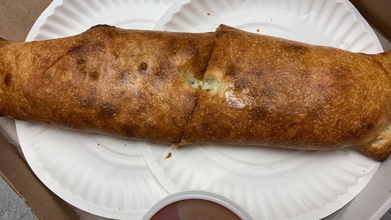 Order Chicken Cheesesteak Stromboli - Small food online from Villa Pizzeria store, Exeter on bringmethat.com