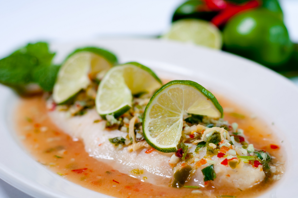 Order Steamed Fish in Lime Sauce Rice food online from Thai Topaz store, San Antonio on bringmethat.com