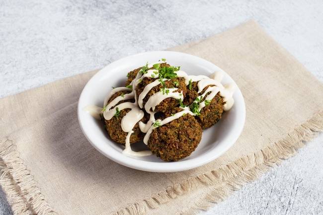 Order Green Herb Falafel (5 pieces) food online from Noshery store, San Mateo on bringmethat.com