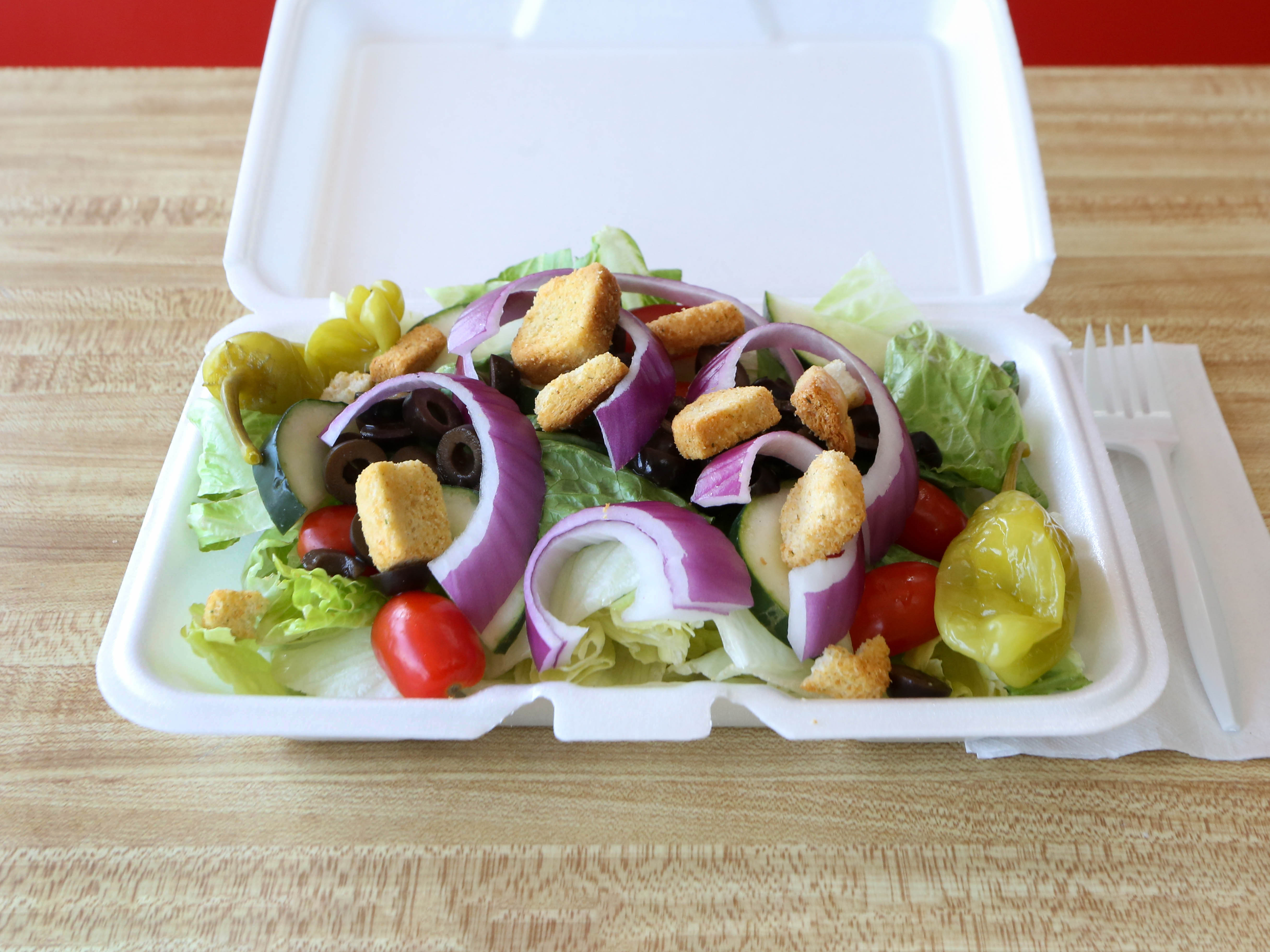 Order Tossed Salad food online from Downtown Pizza store, New Haven on bringmethat.com