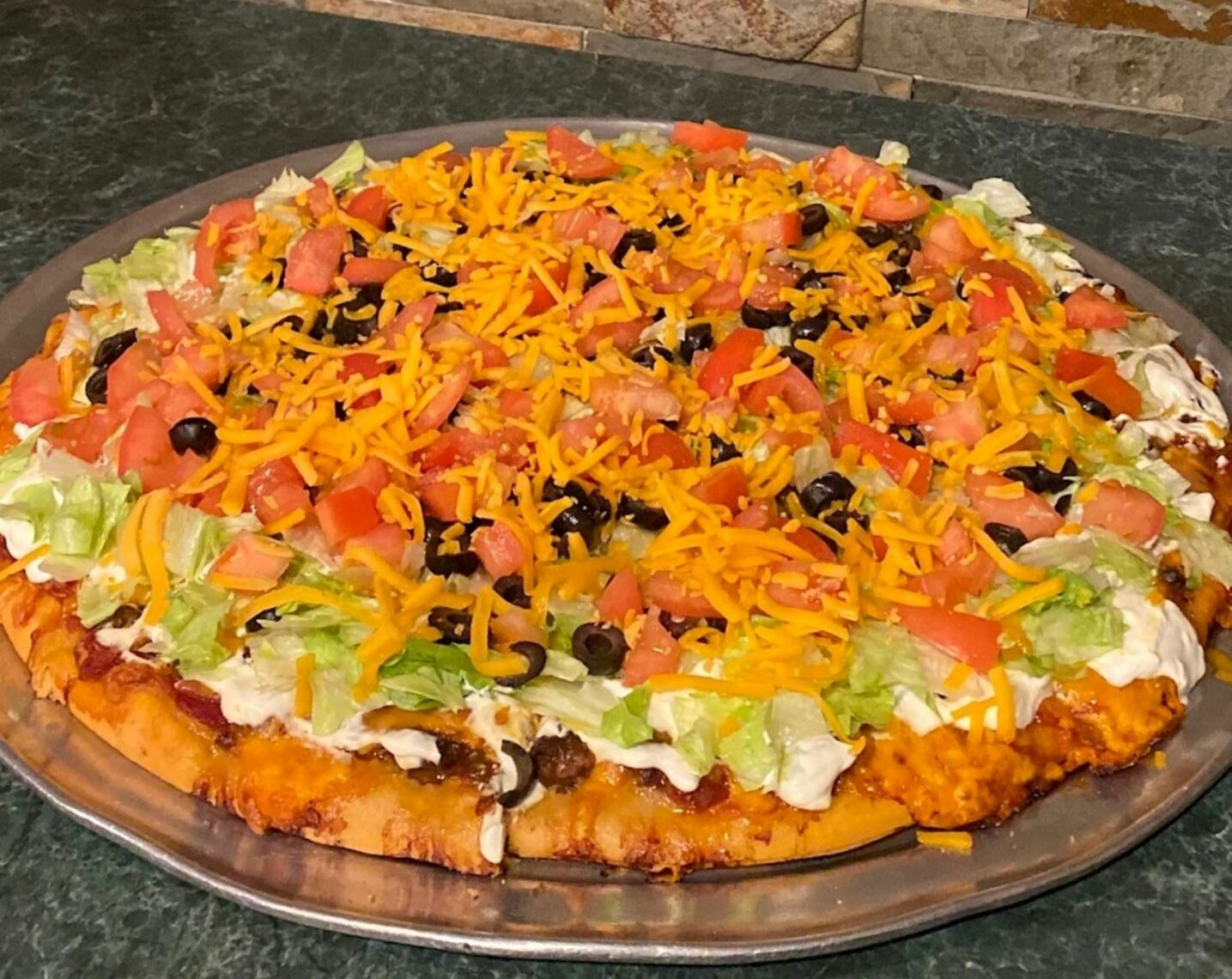 Order Taco Pizza food online from Beggars Pizza store, Gary on bringmethat.com