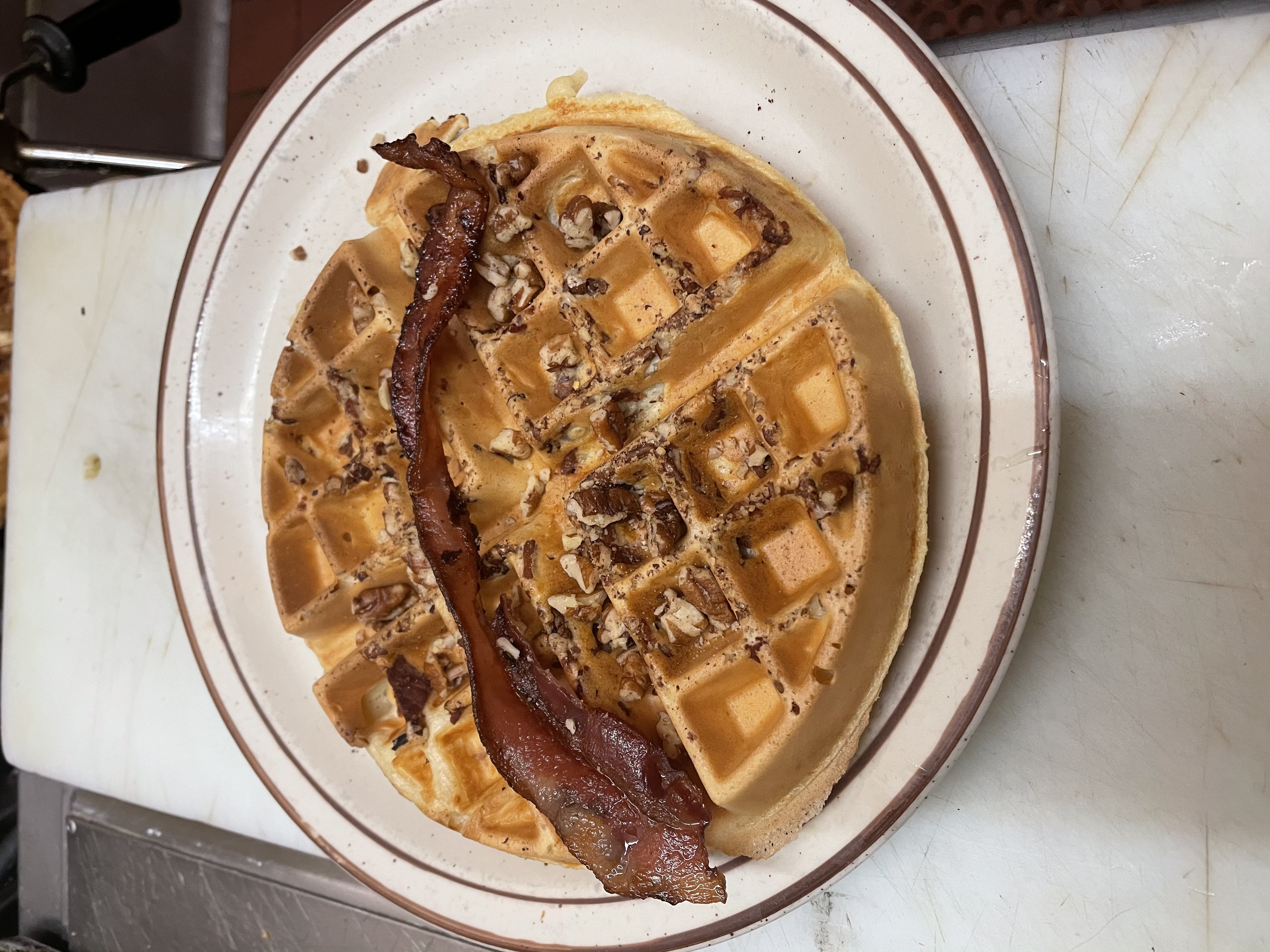 Order Bacon-Pecan Waffle food online from Waffles Breakfast & Lunch store, Salinas on bringmethat.com