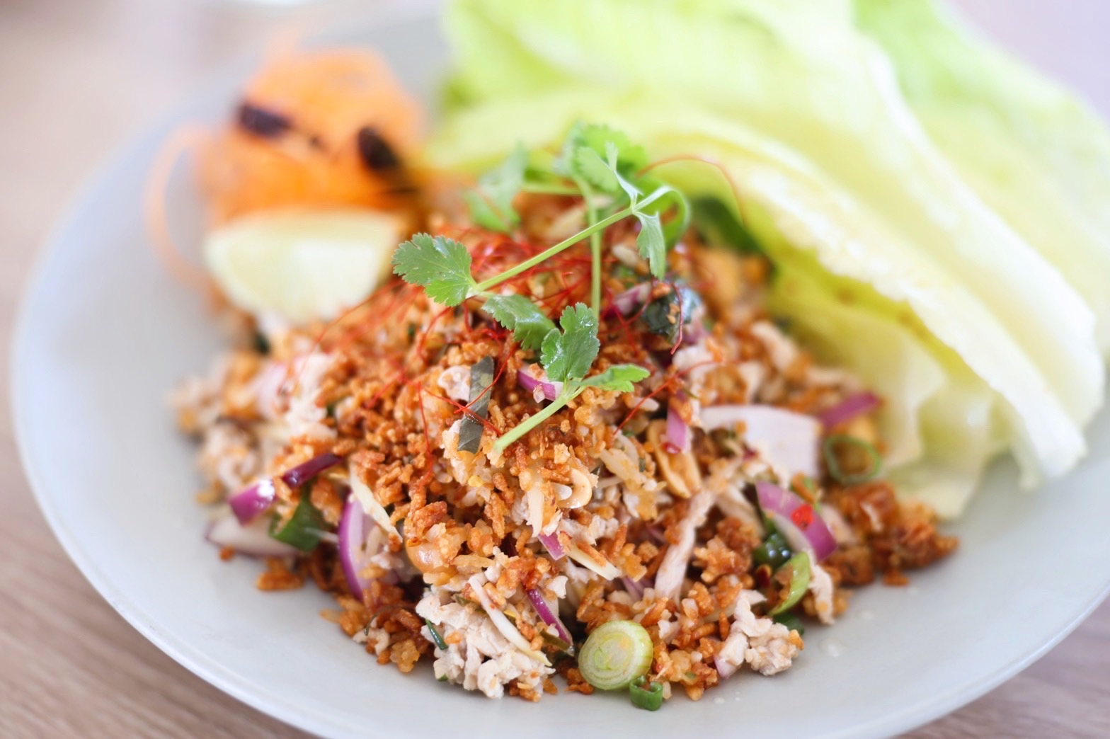 Order  Yum Nam Kao Tod food online from Charm Thai Bistro store, Oakland on bringmethat.com