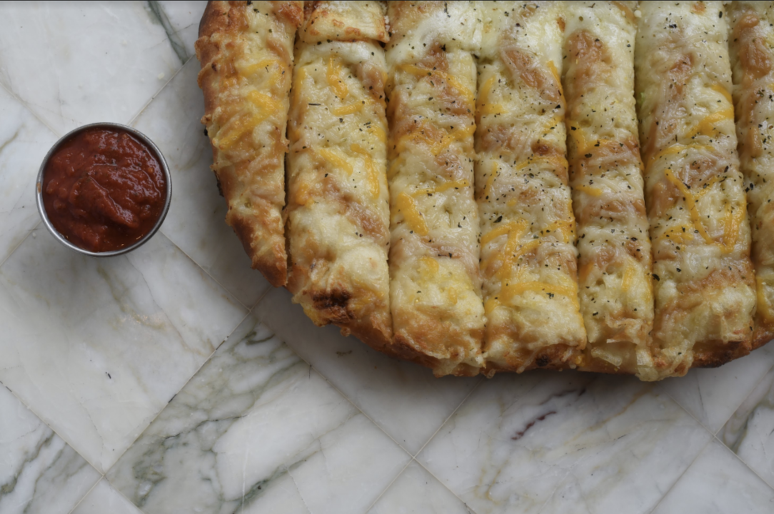 Order Vegan Cheesy Garlic Bread food online from Dimo Pizza store, Chicago on bringmethat.com