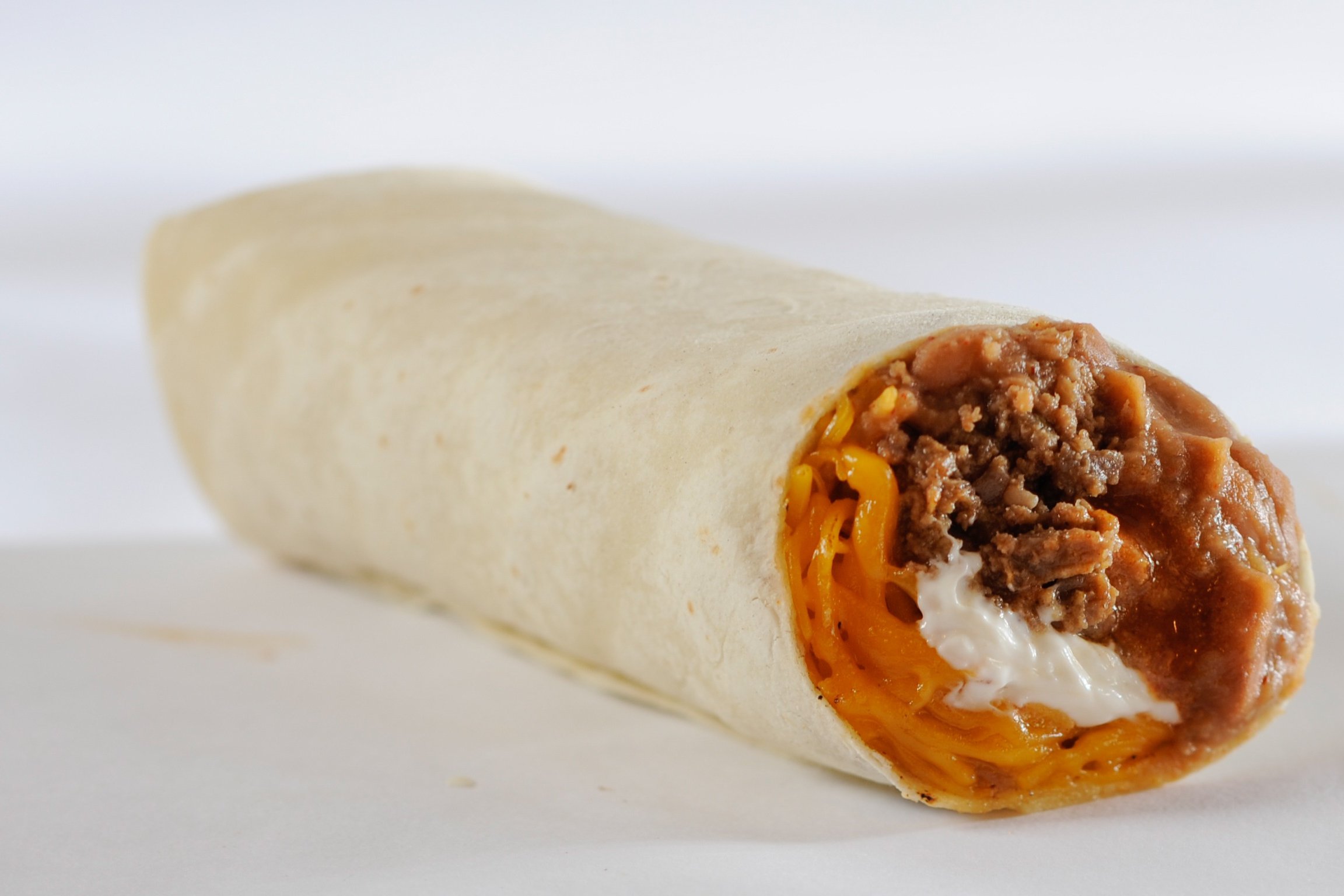 Order Combo Burrito food online from Amigos/Kings Classic store, Lincoln on bringmethat.com