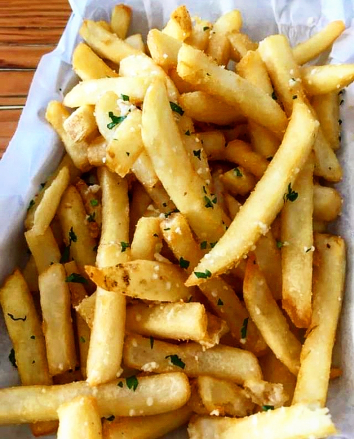 Order *TRUFFLE FRIES food online from The Grind Burger Bar store, The Colony on bringmethat.com