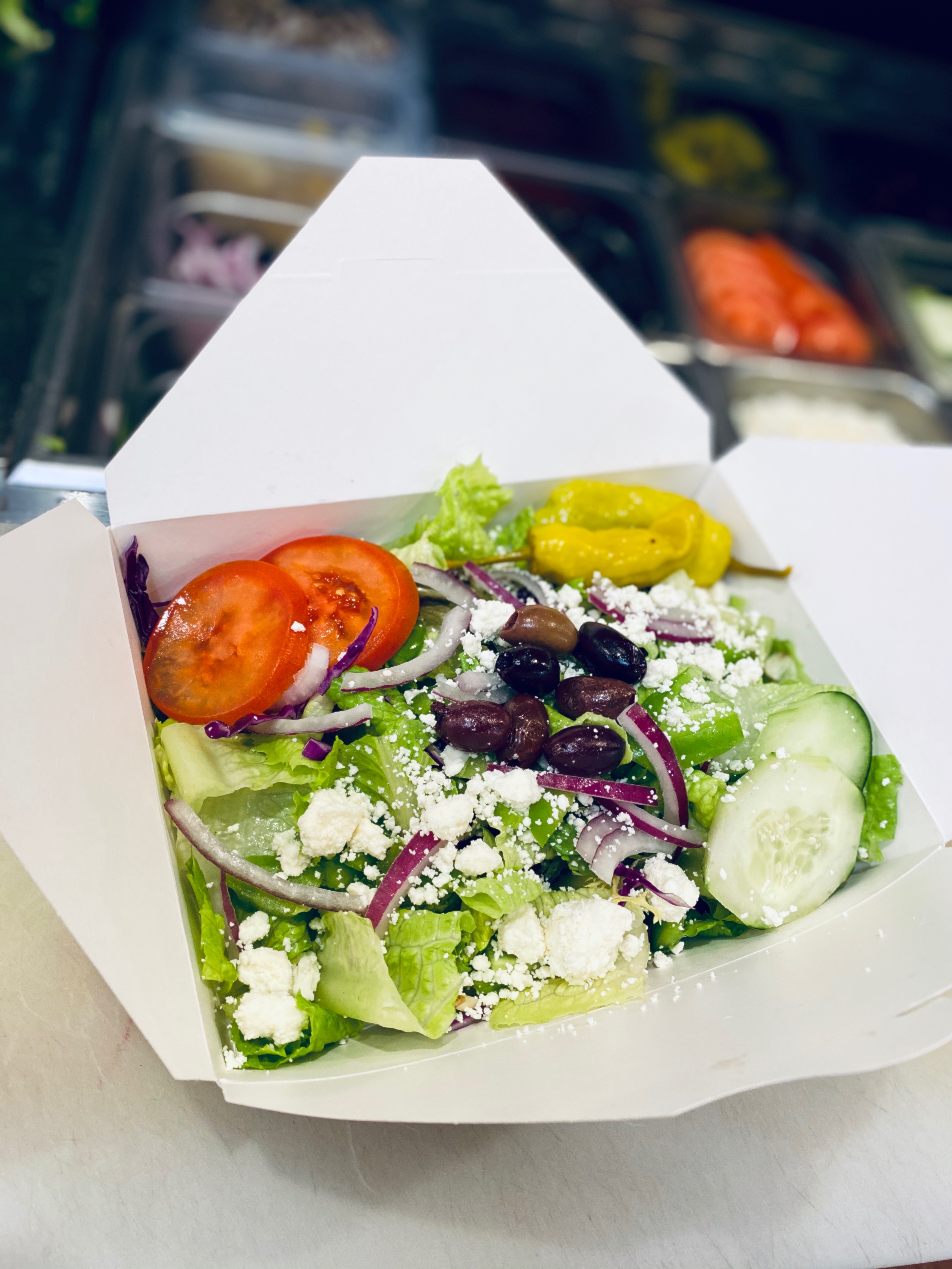 Order Greek Salad food online from Amante Pizza store, Kent on bringmethat.com