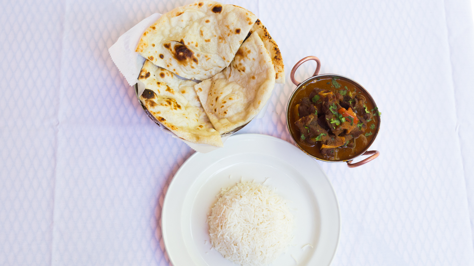 Order Homestyle Goat Curry food online from Swagat Indian Cuisine store, Portland on bringmethat.com