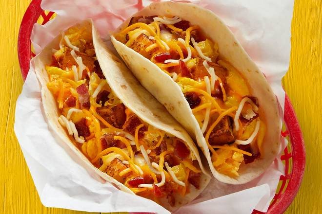 Order Bacon, Potatoes, Egg, & Cheese Taco food online from Fuzzy's Taco Shop store, Tempe on bringmethat.com