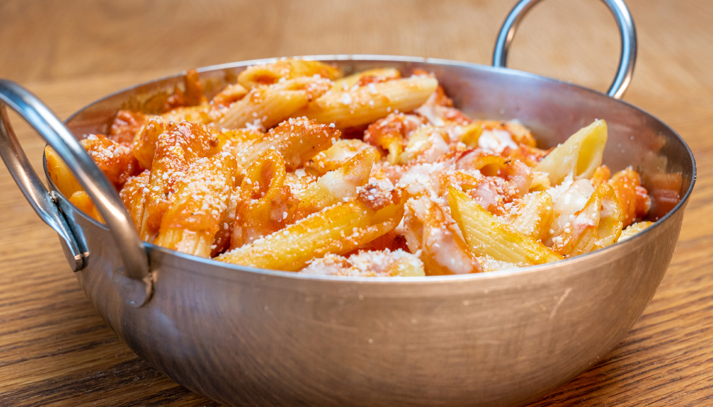 Order Vodka Sauce Penne food online from Mr. Moto's Pizza store, San Diego on bringmethat.com