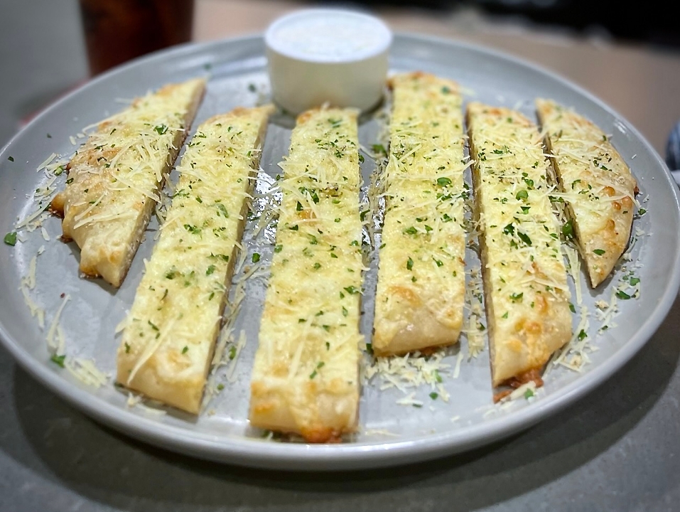 Order Garlic Cheesy Bread food online from Snakes & Lattes Tucson store, Tucson on bringmethat.com