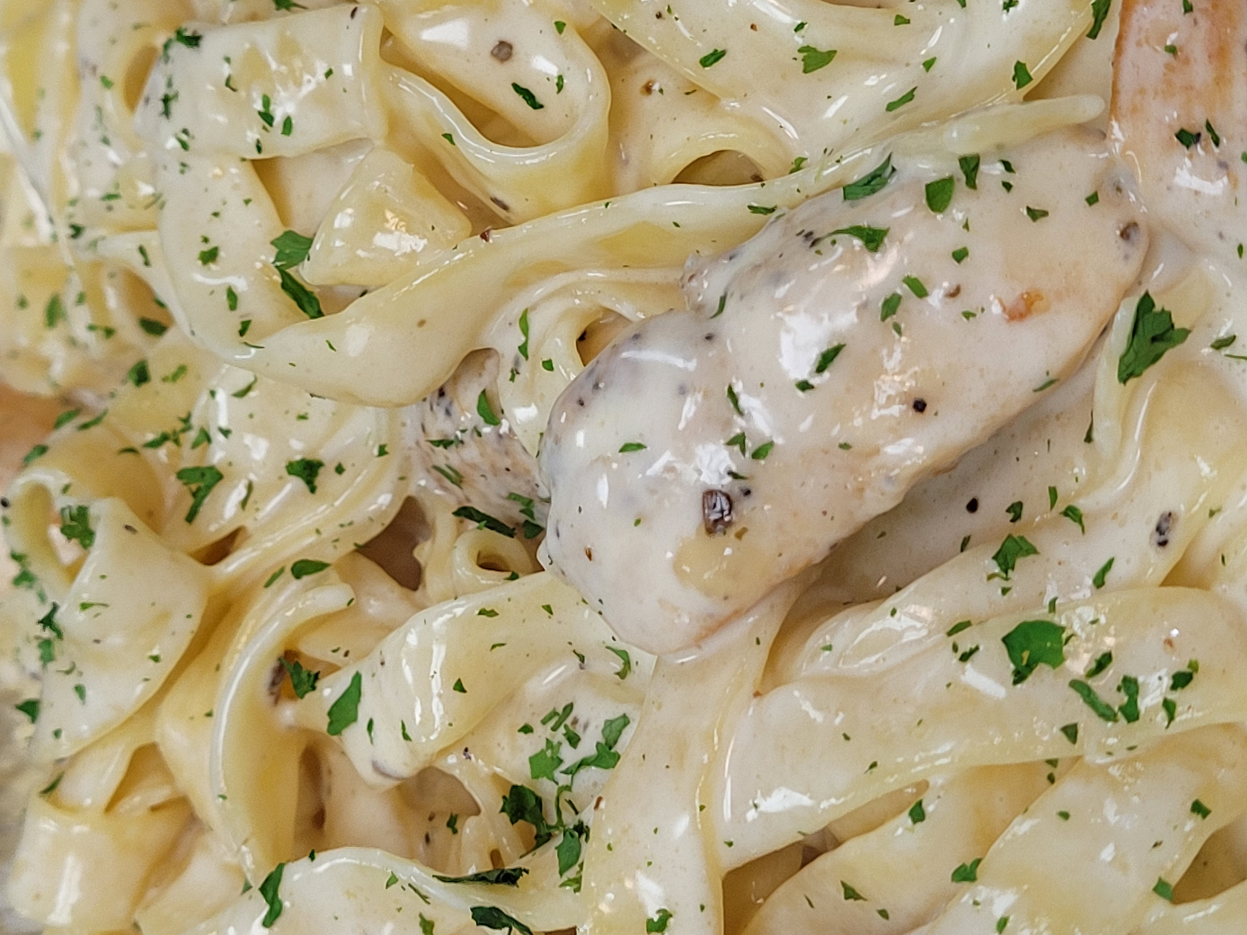 Order Cajun Chicken and Shrimp Alfredo food online from Illianos Pizza store, Clemmons on bringmethat.com