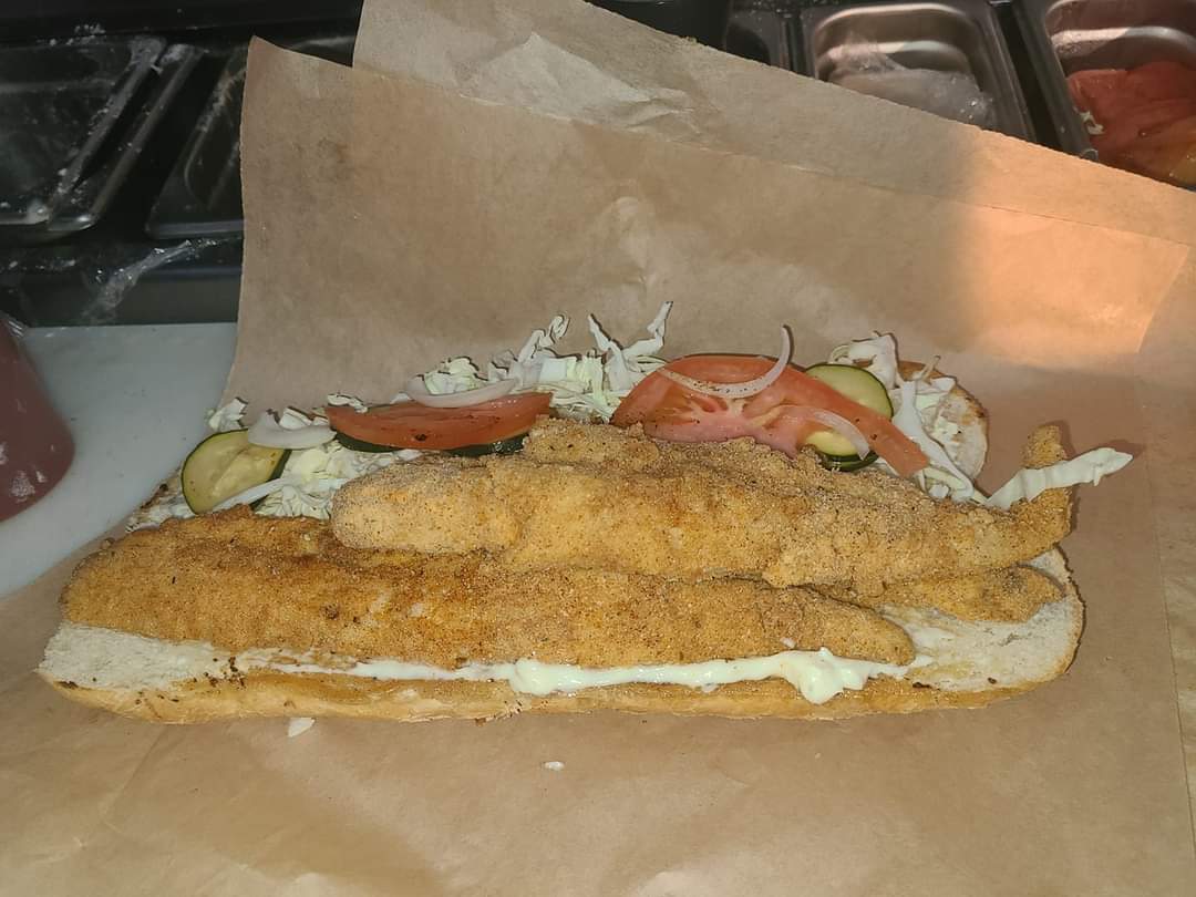 Order Fish  PoBoy food online from Everything Between Bunzz store, Oakland on bringmethat.com