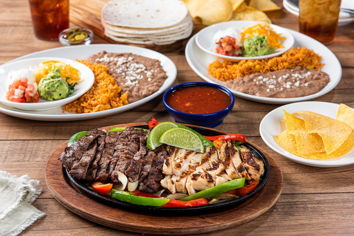 Order Classic Fajitas for Two food online from On The Border store, Westland on bringmethat.com