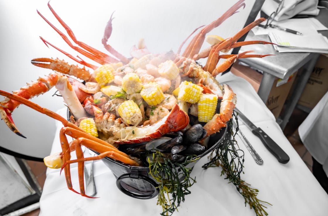 Order The Cape Cod Clam Bake Bucket - 1/2 Single (Serves 2 People) food online from Alessios Seafood Grille store, Warrington on bringmethat.com