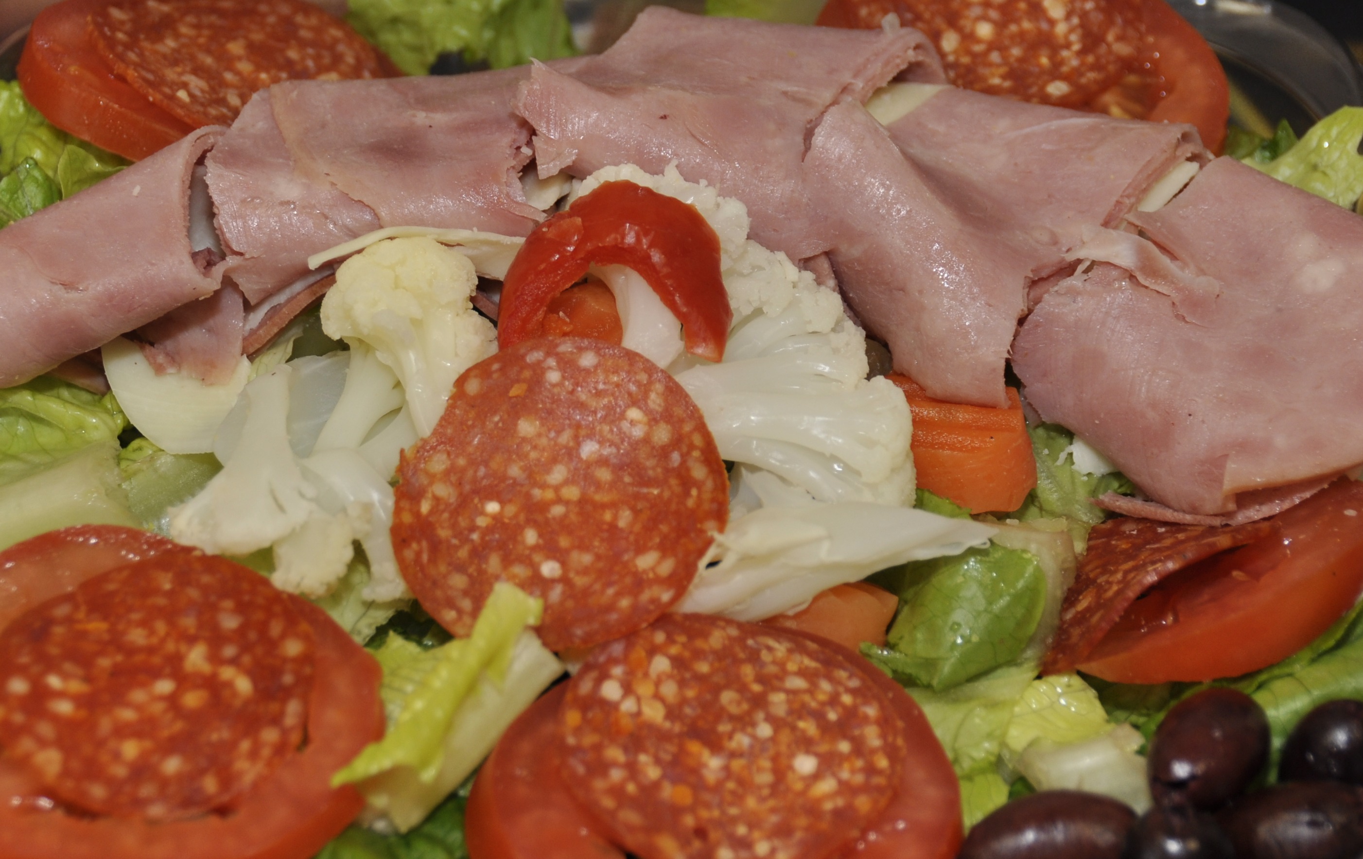 Order Antipasto Salad food online from Mega Pizza store, Raleigh on bringmethat.com