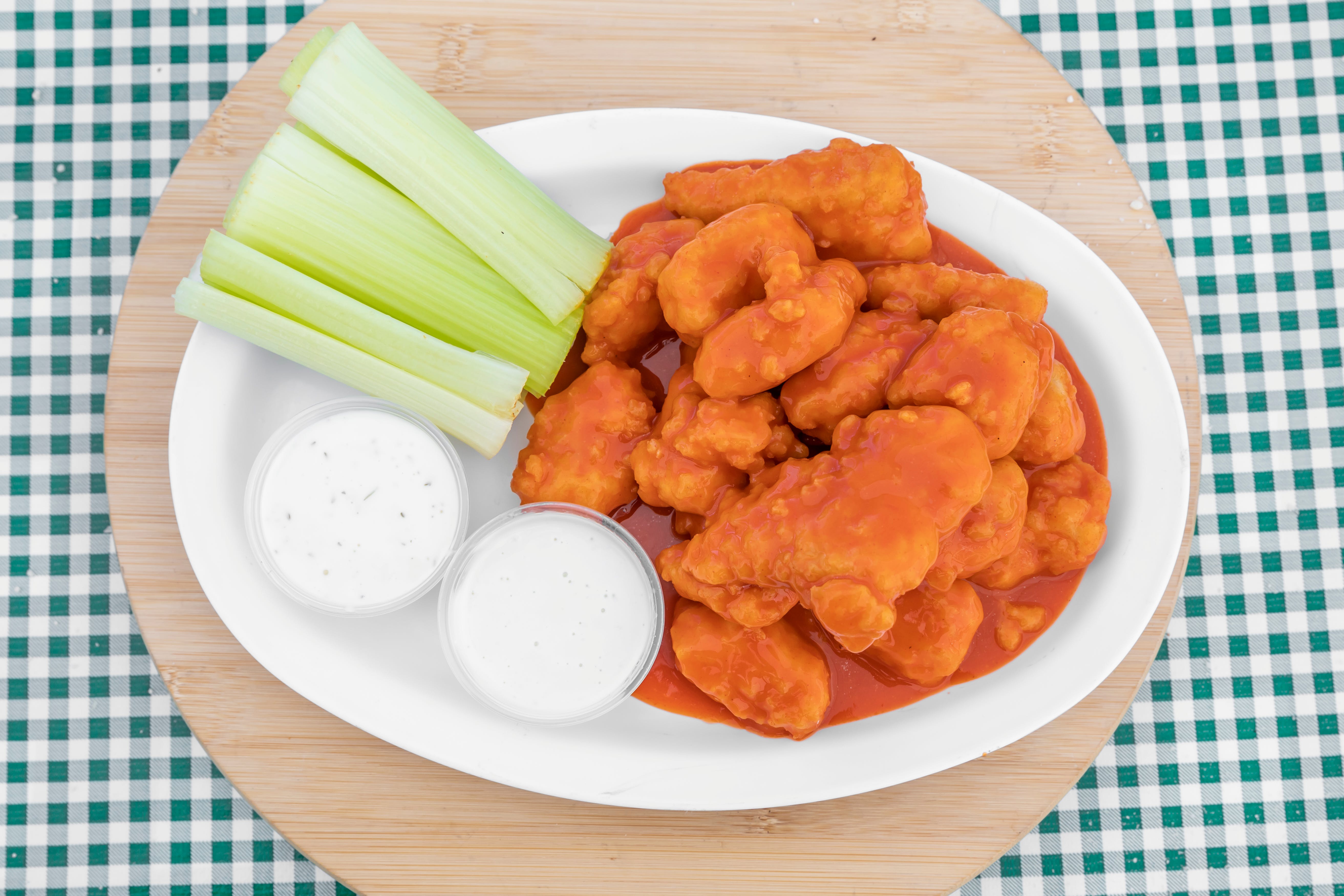 Order Boneless Wings - 10 Pieces food online from The Pizza Store store, Laguna Hills on bringmethat.com