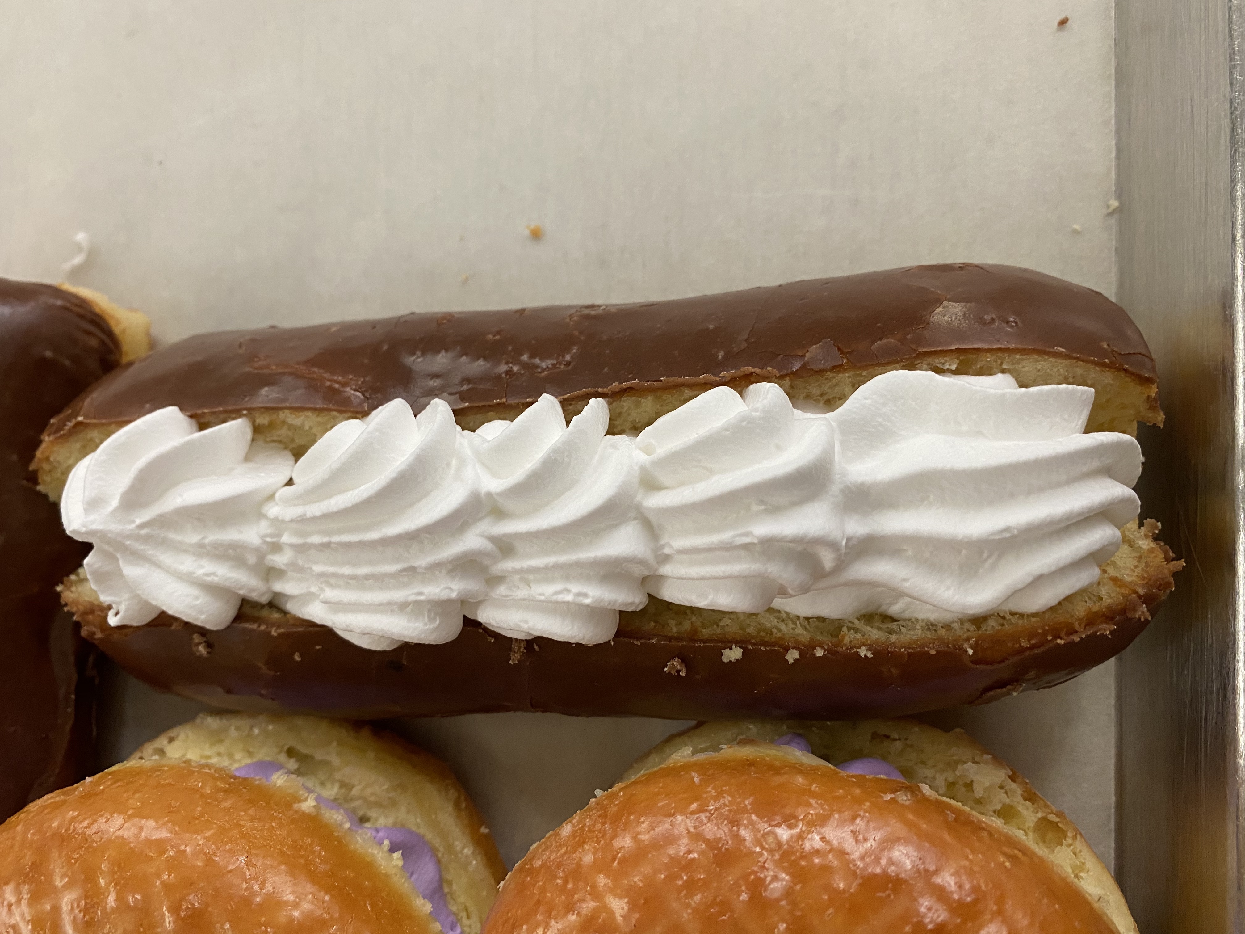 Order Choc Bar Donut with Whip Cream food online from Earl Donut store, Los Angeles on bringmethat.com