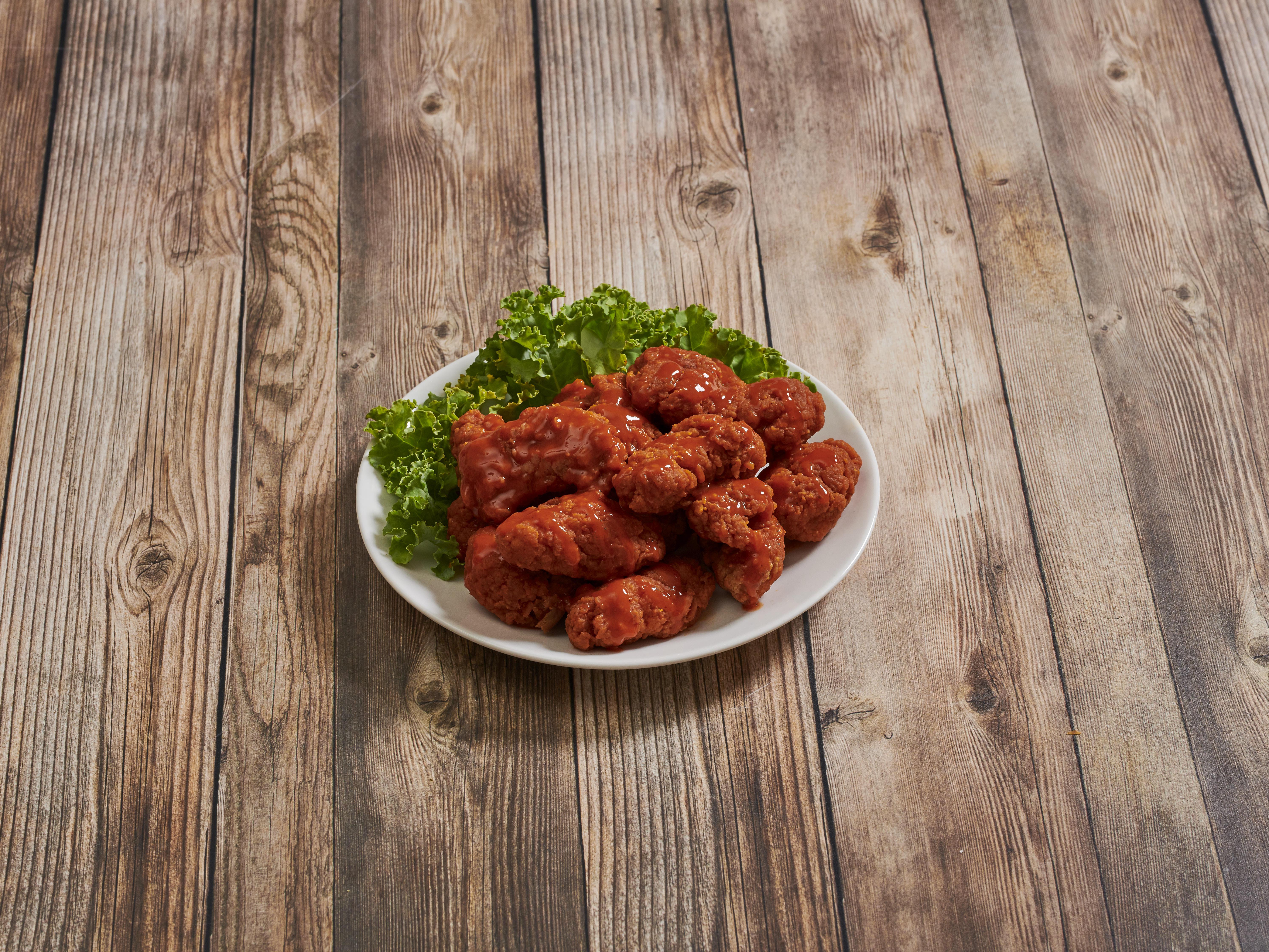 Order 12 Wings food online from Armando's Express Pizza store, Whitehall on bringmethat.com