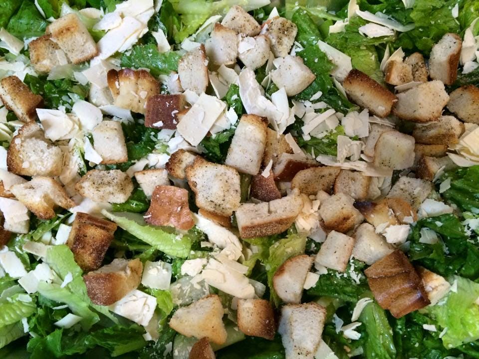 Order Caesar Salad - Salad food online from Tonys Pizzeria & Italian Restaurant store, Audubon on bringmethat.com
