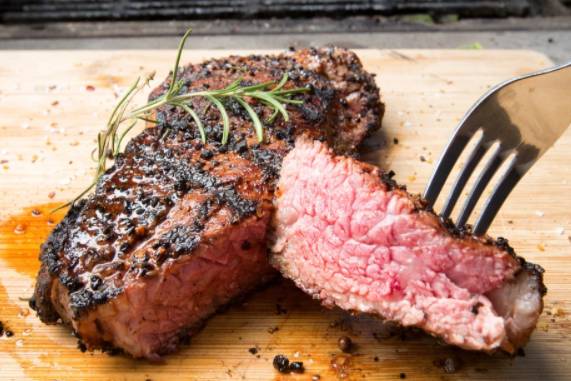 Order New York Strip (12 oz) food online from Juicy Crab Seafood And Steak House store, Manheim Township on bringmethat.com