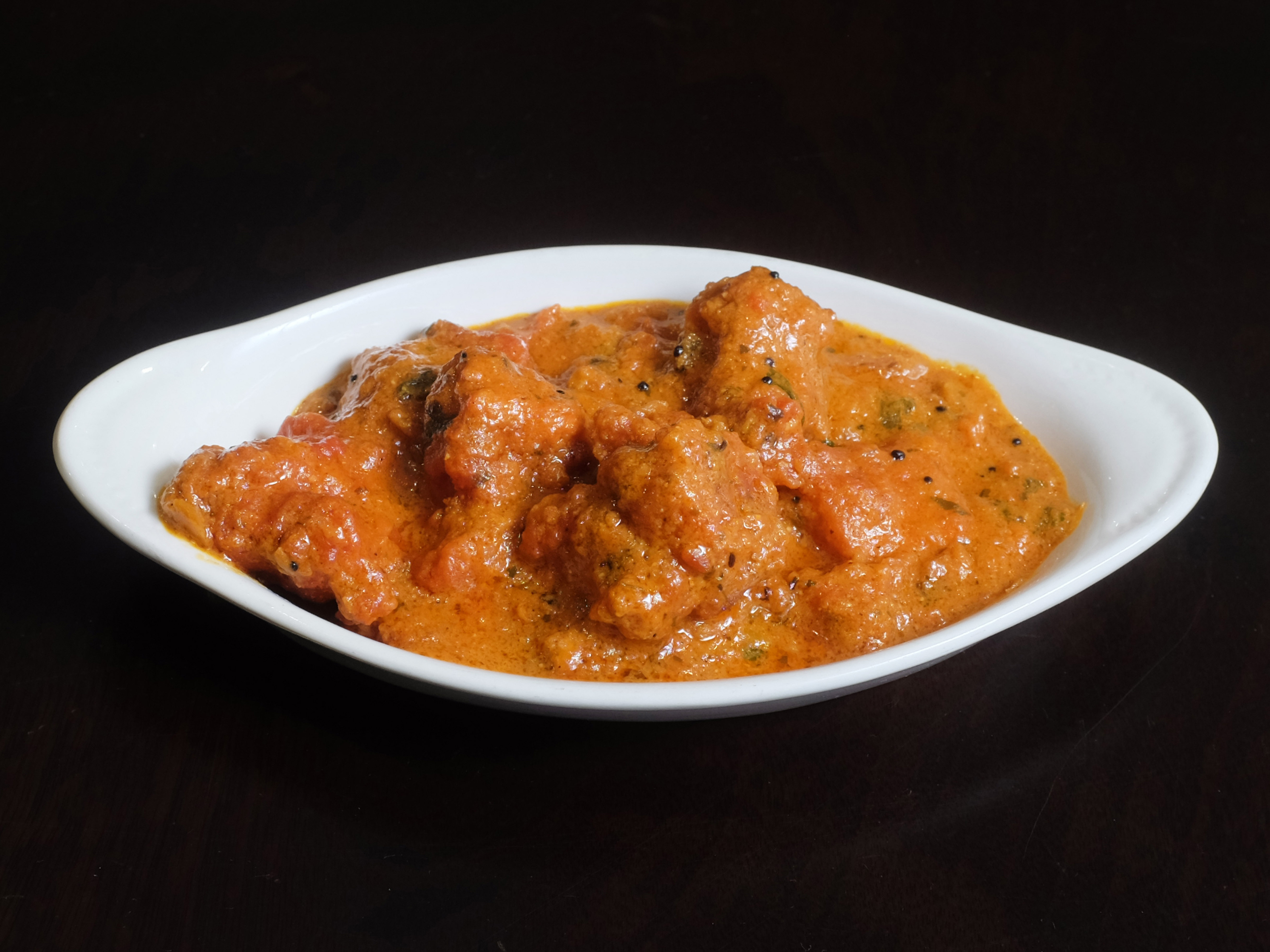 Order 8.) Andhra Fish Curry food online from New Paradise store, Wichita on bringmethat.com