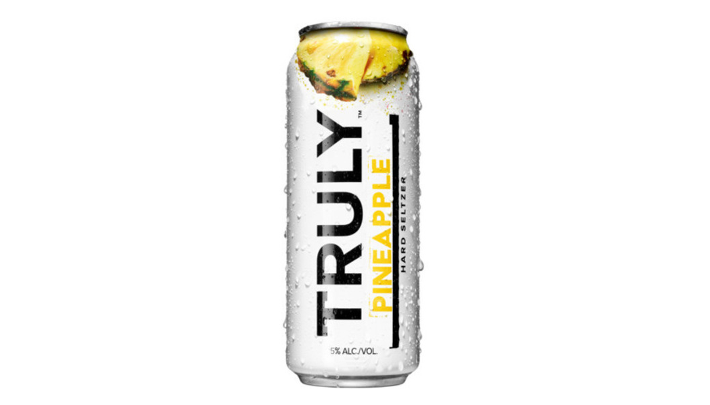 Order TRULY Hard Seltzer Pineapple, Spiked & Sparkling Water 24oz Can food online from Orcutt Liquor & Deli store, Orcutt on bringmethat.com
