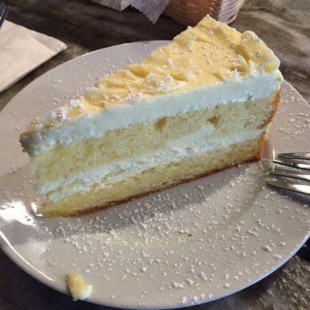 Order Limoncello Cake food online from Nostra Pizza store, Greensboro on bringmethat.com