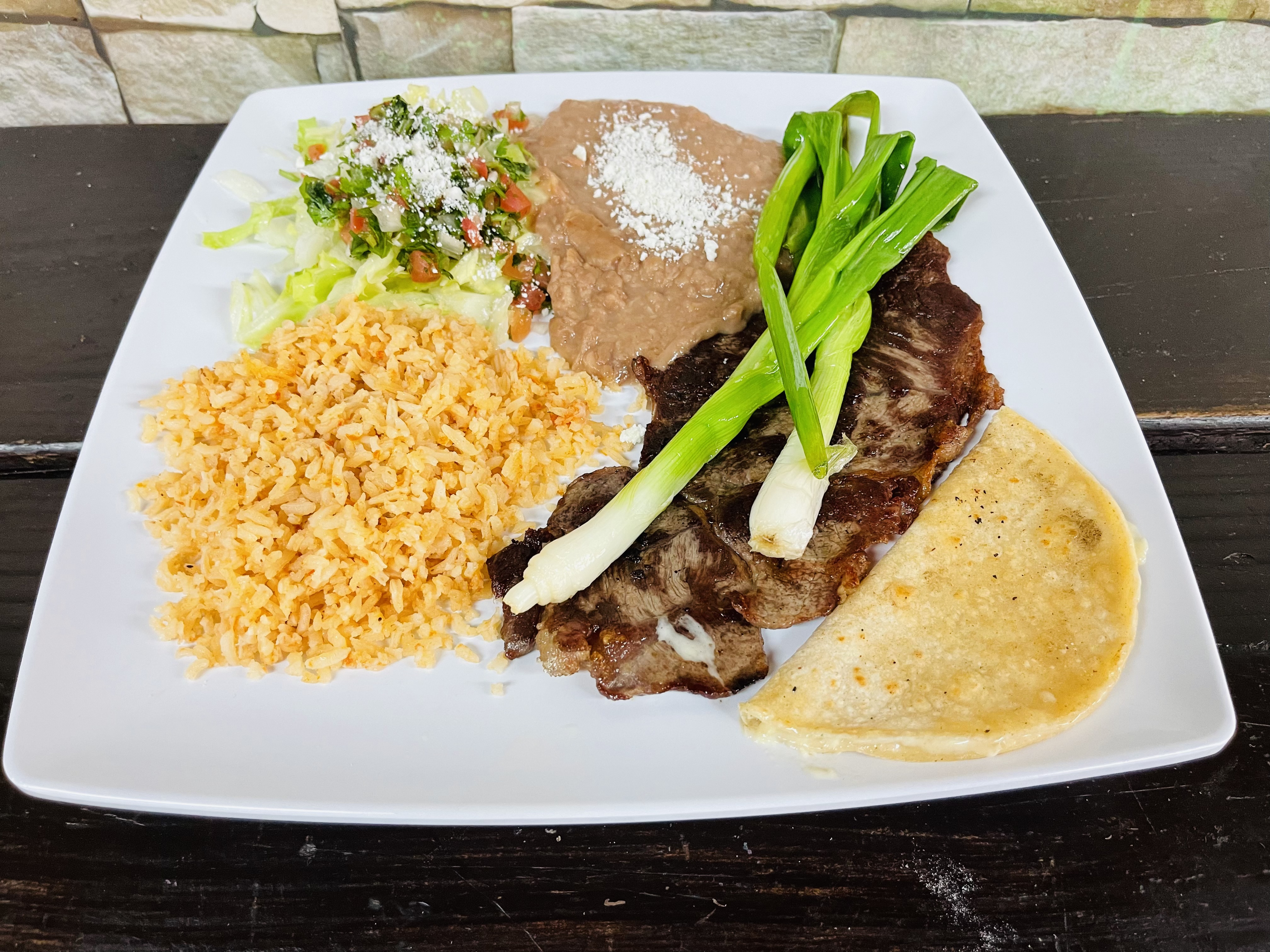 Order Carne Asada Plate food online from El Guapito Mexican Food store, Bell Gardens on bringmethat.com