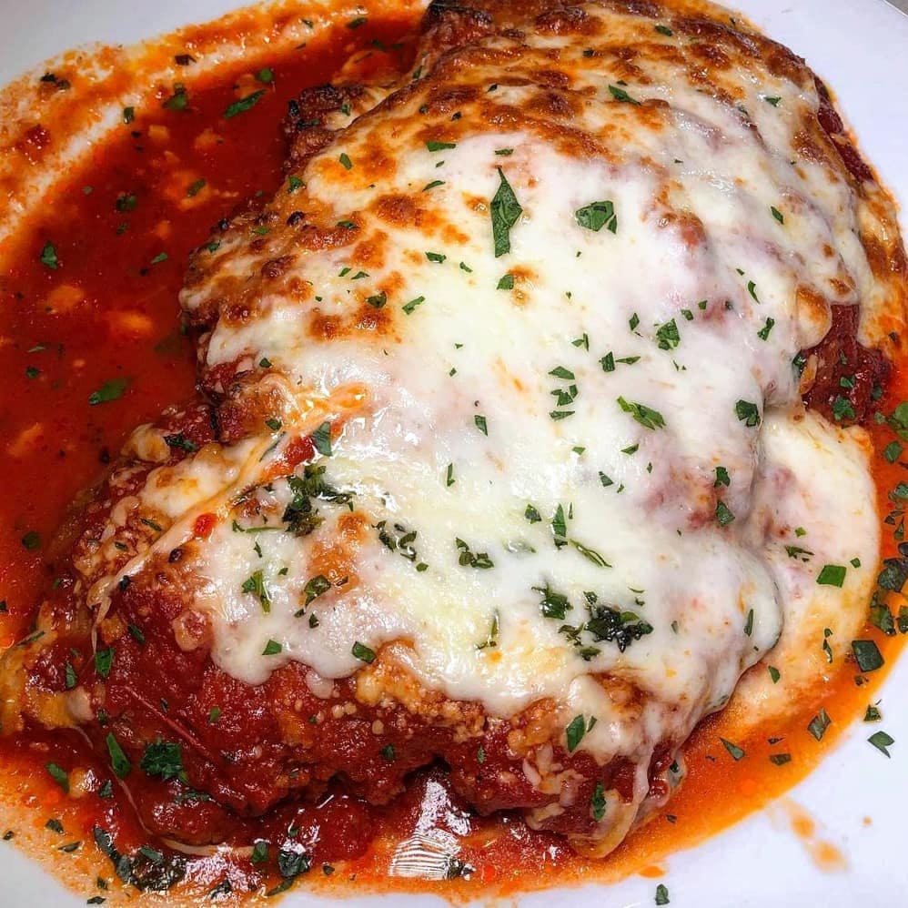 Order Lasagna al Forno - Pasta food online from Sam Italian Cafe store, Fort Worth on bringmethat.com